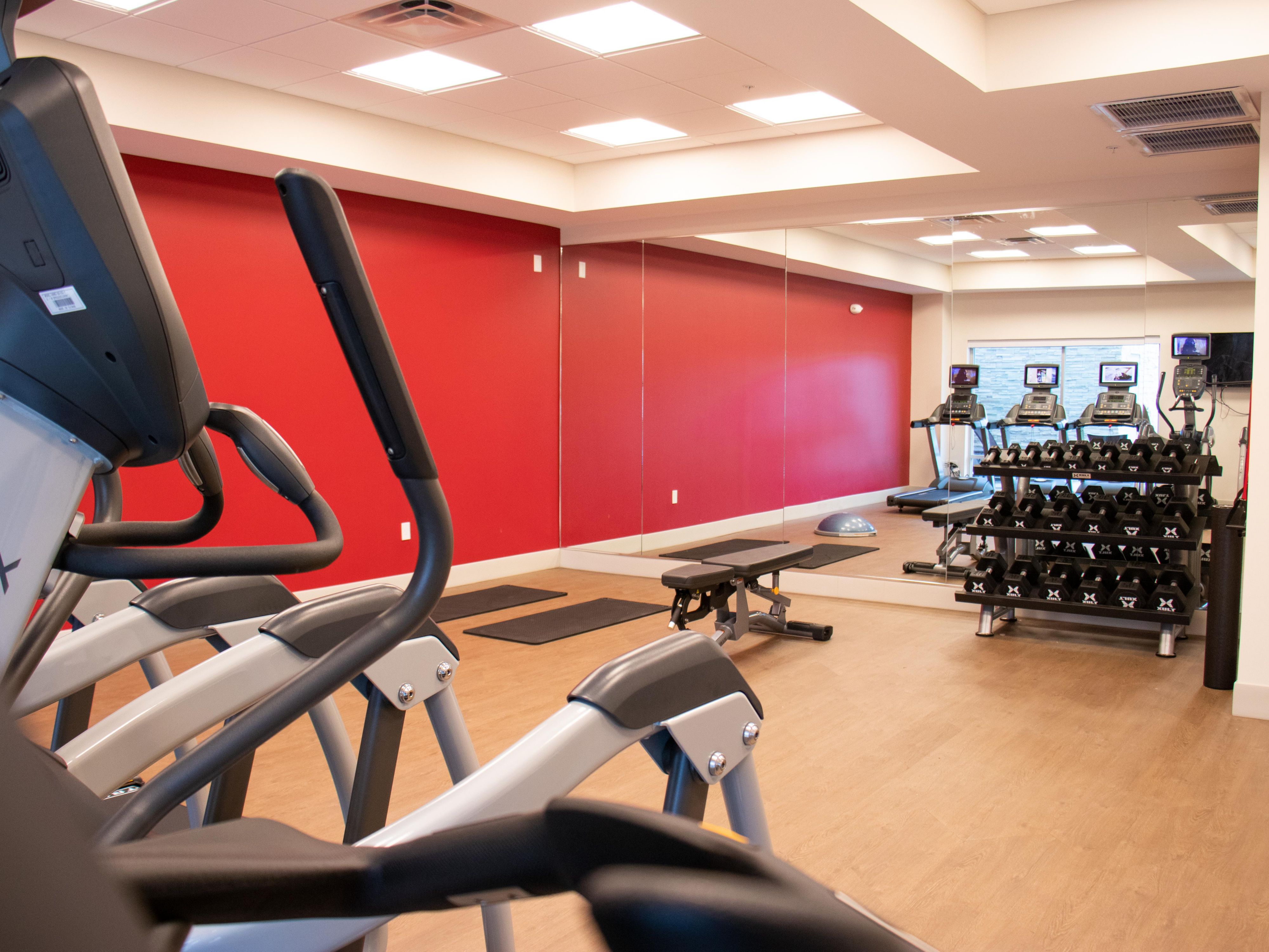 Keep active even when on the road. Our fitness center is equipped with treadmills, ellipticals and stationary bike. The open area allows for functional fitness and weight training. Enjoy the natural light and view of the outdoor pool.