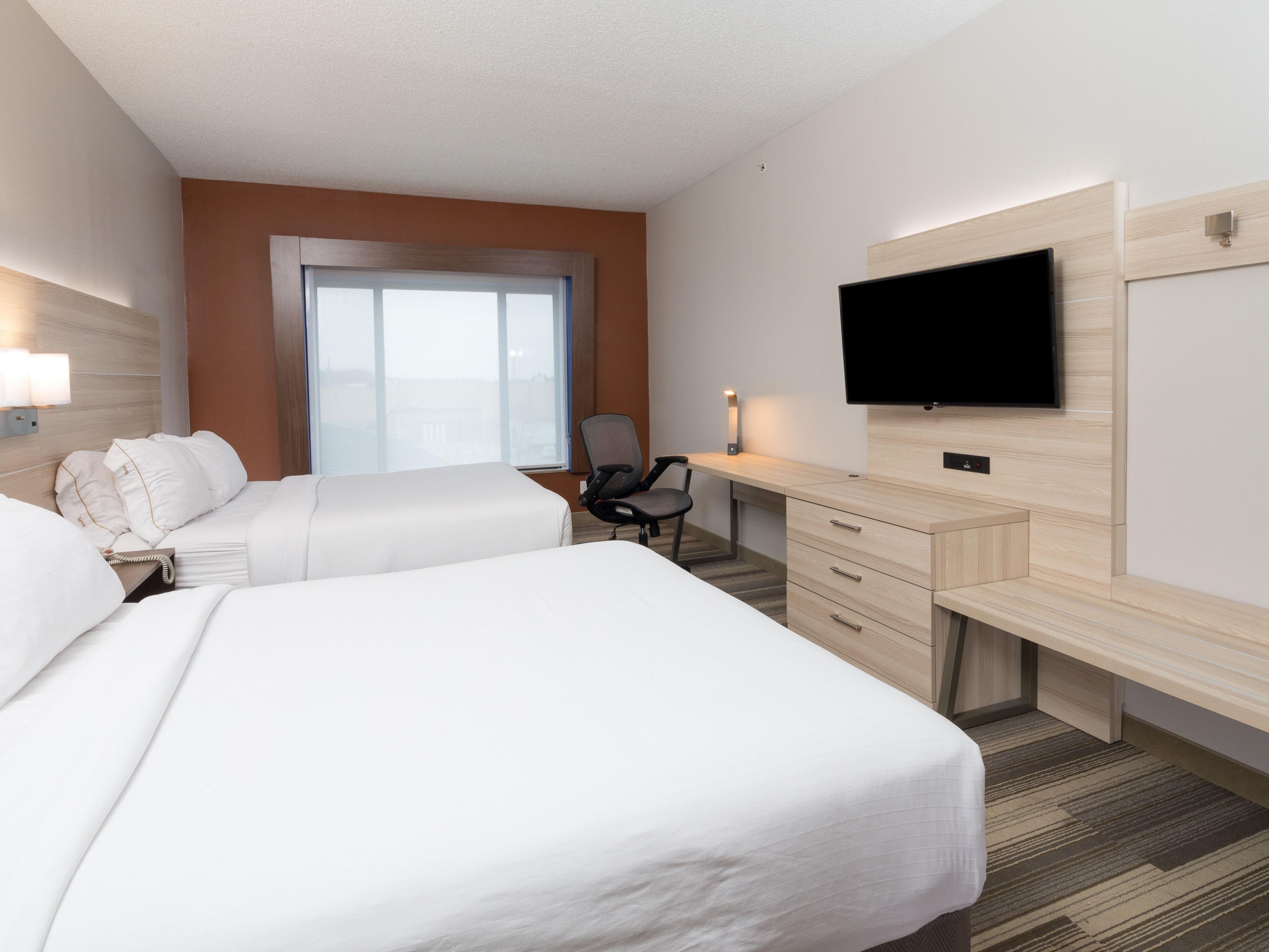 Enjoy 2 queen bed standard guest room with complimentary wifi