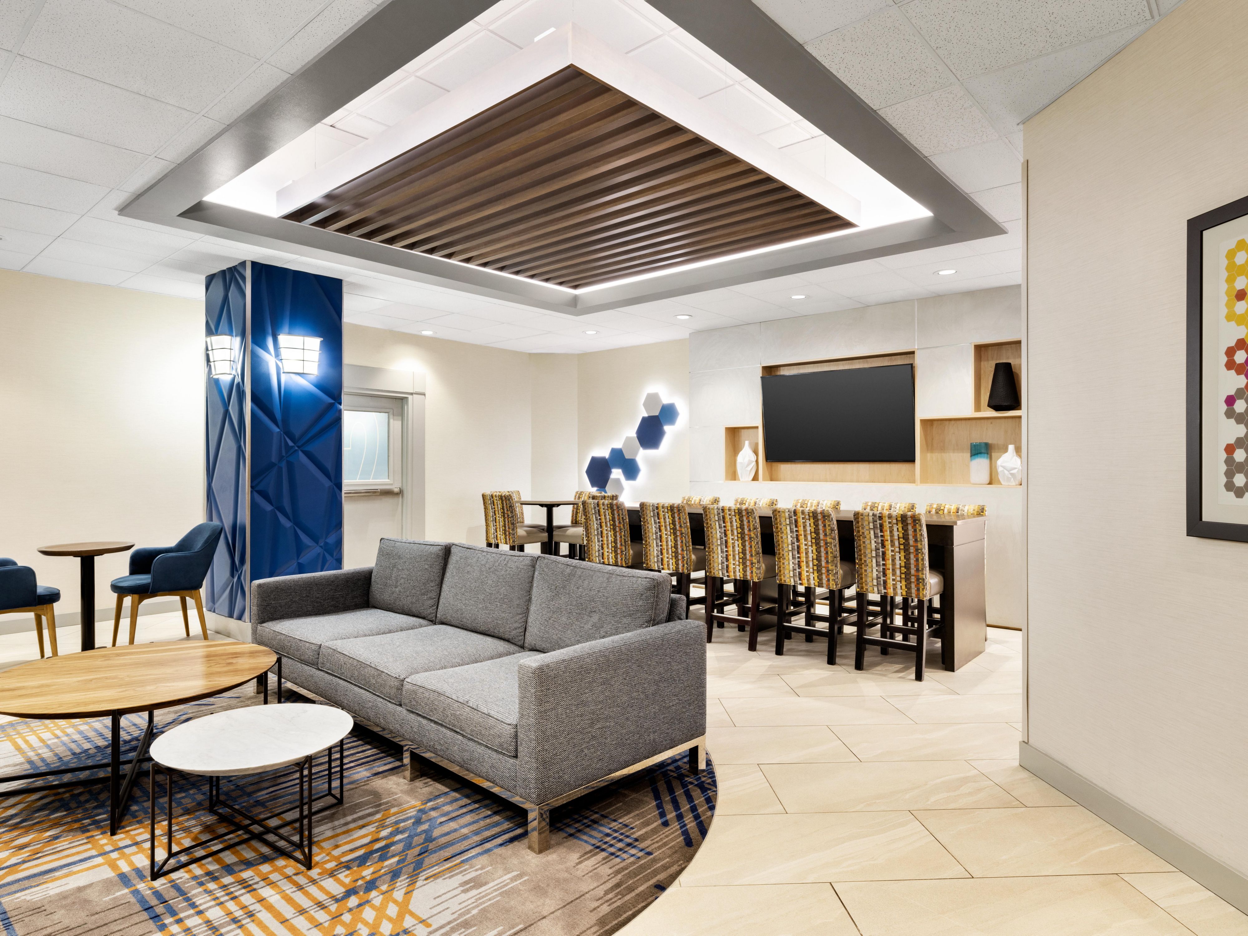 Featuring plush seating, a cozy atmosphere, and easy access to WiFi and business amenities.