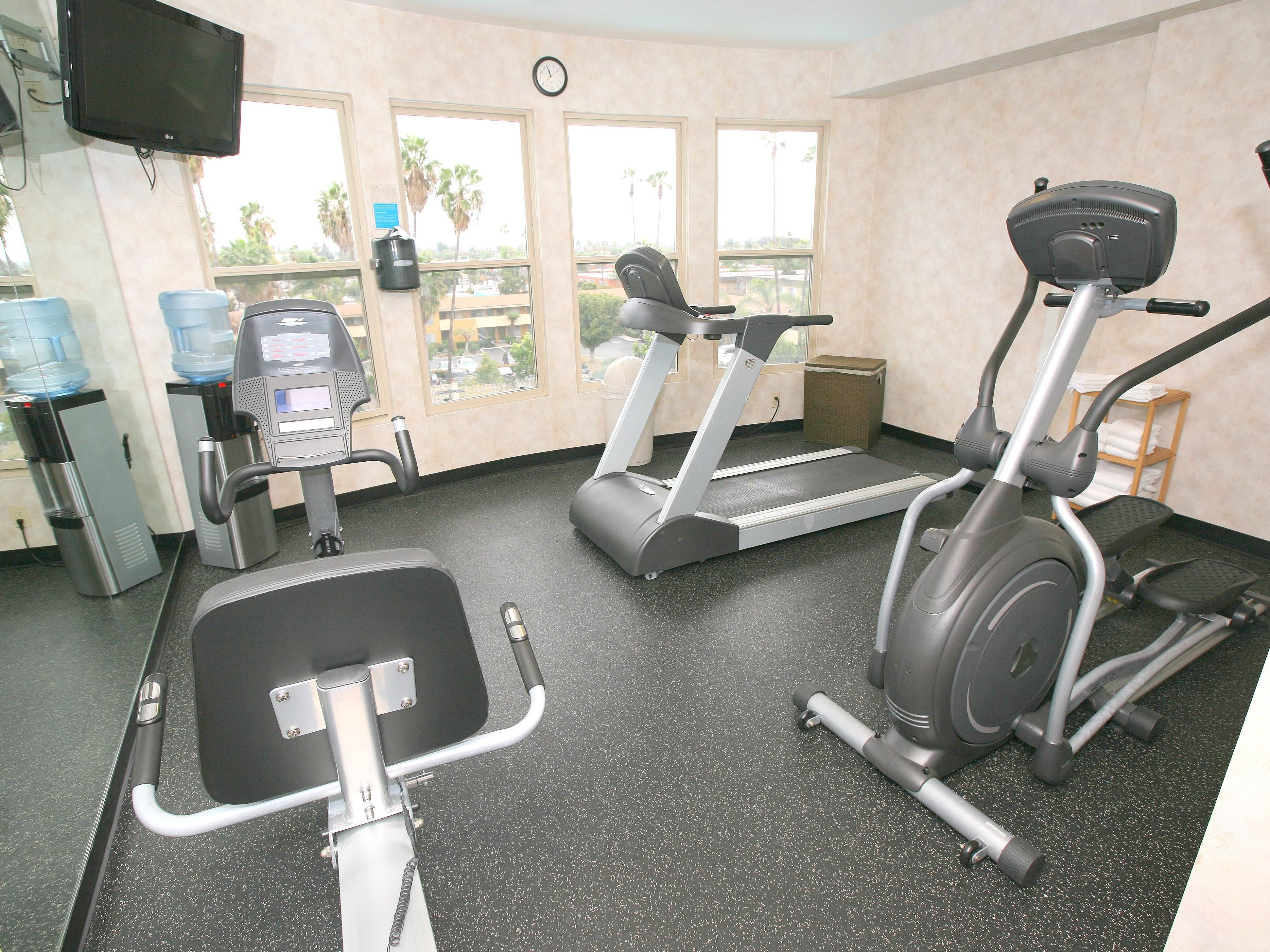 Fitness center is open 24 hours and is equipped with Treadmill, Stationary Bike & Elliptical, flat screen TV, water cooler and scale. Fitness center is located on the top floor with a beautiful evening view of the city lights.