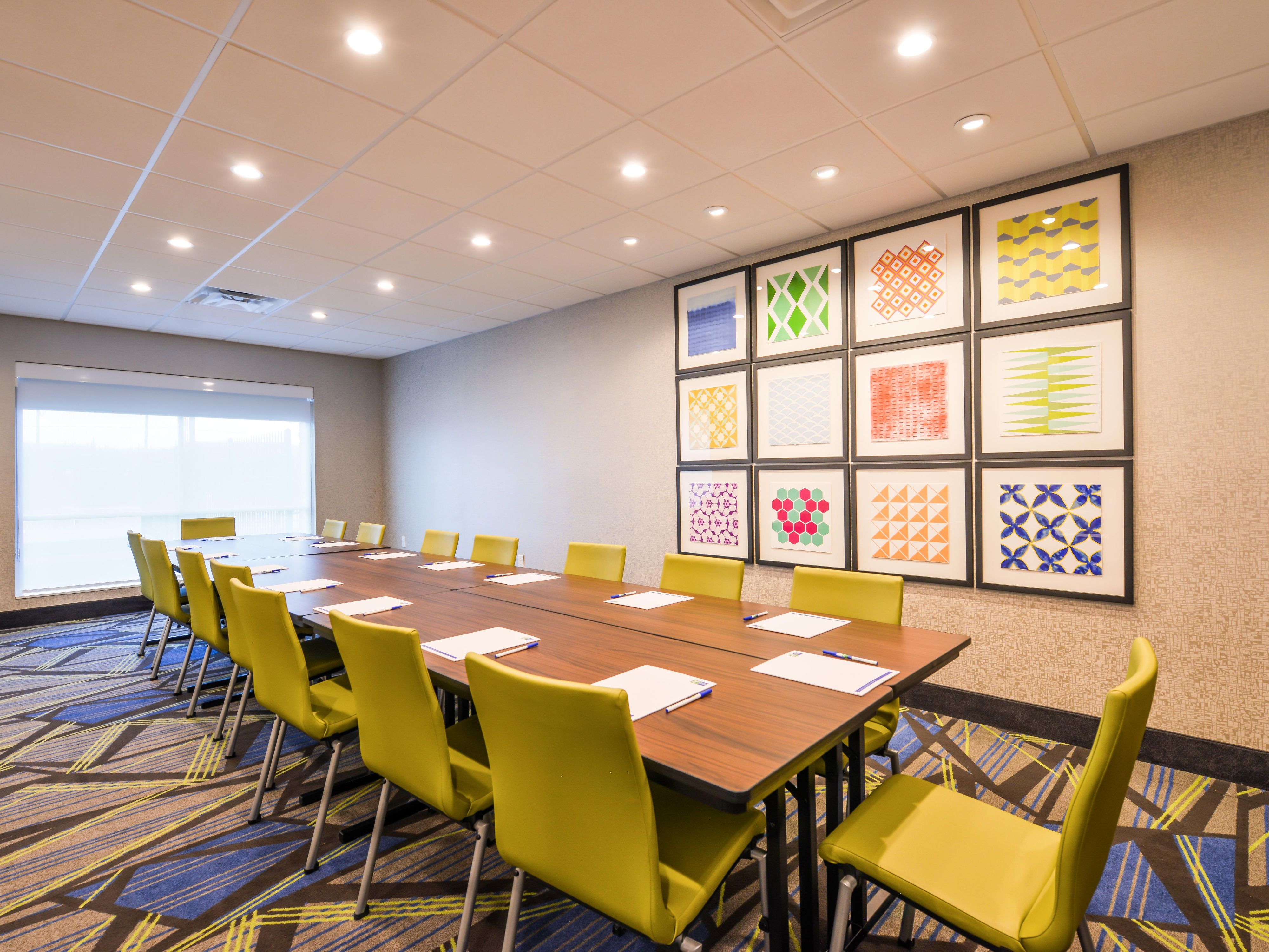 Whether it's a presentation or meeting, our Board Room is perfect to help you put your best foot forward.  Put your ideas on the big screen with an available television to connect to.  A large picture window pours natural light in while you control the view with the retractable shade. 300 square feet of space accommodates up to 20 guests.  