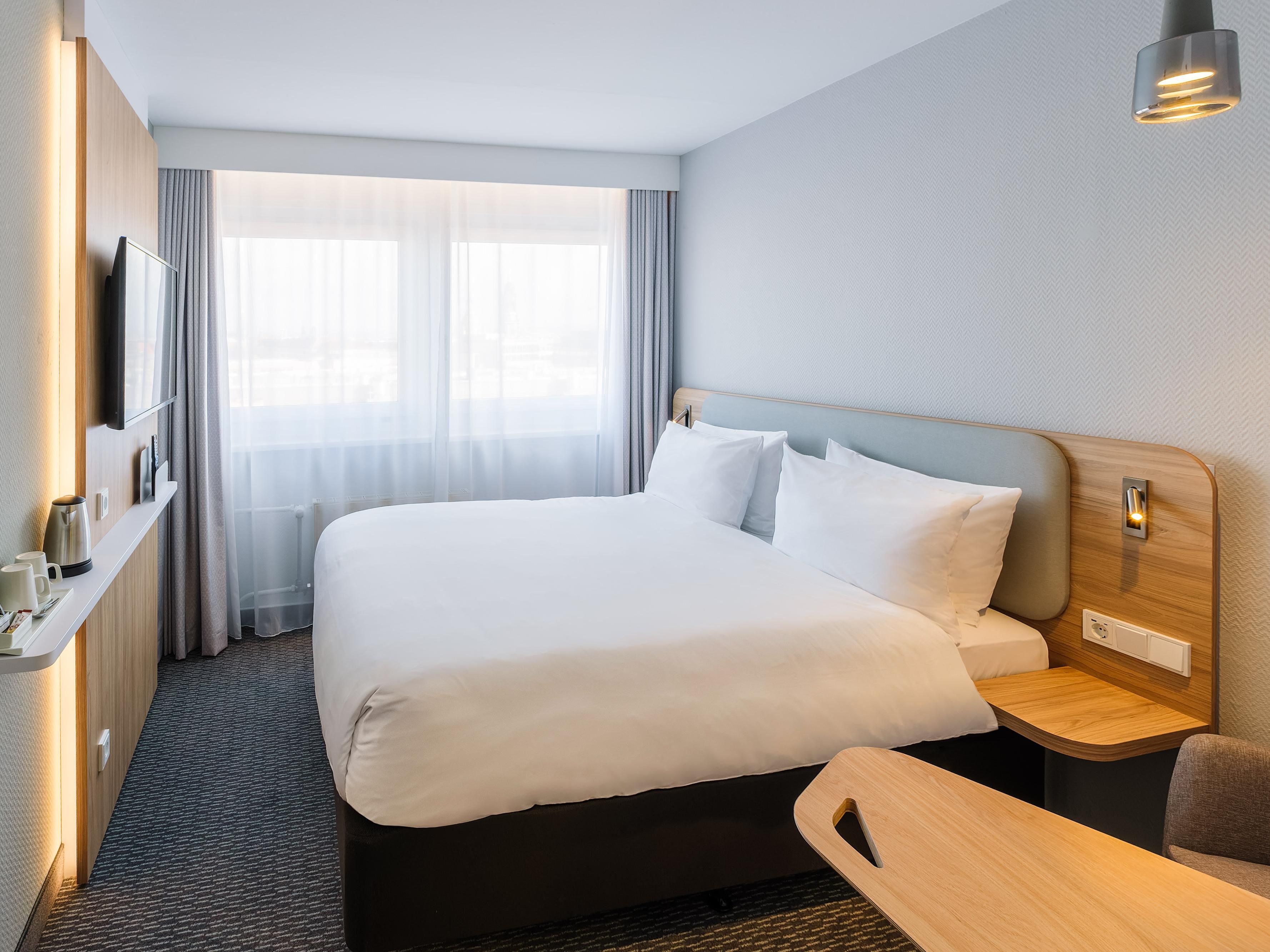 The bedside lights are handy for reading a book.