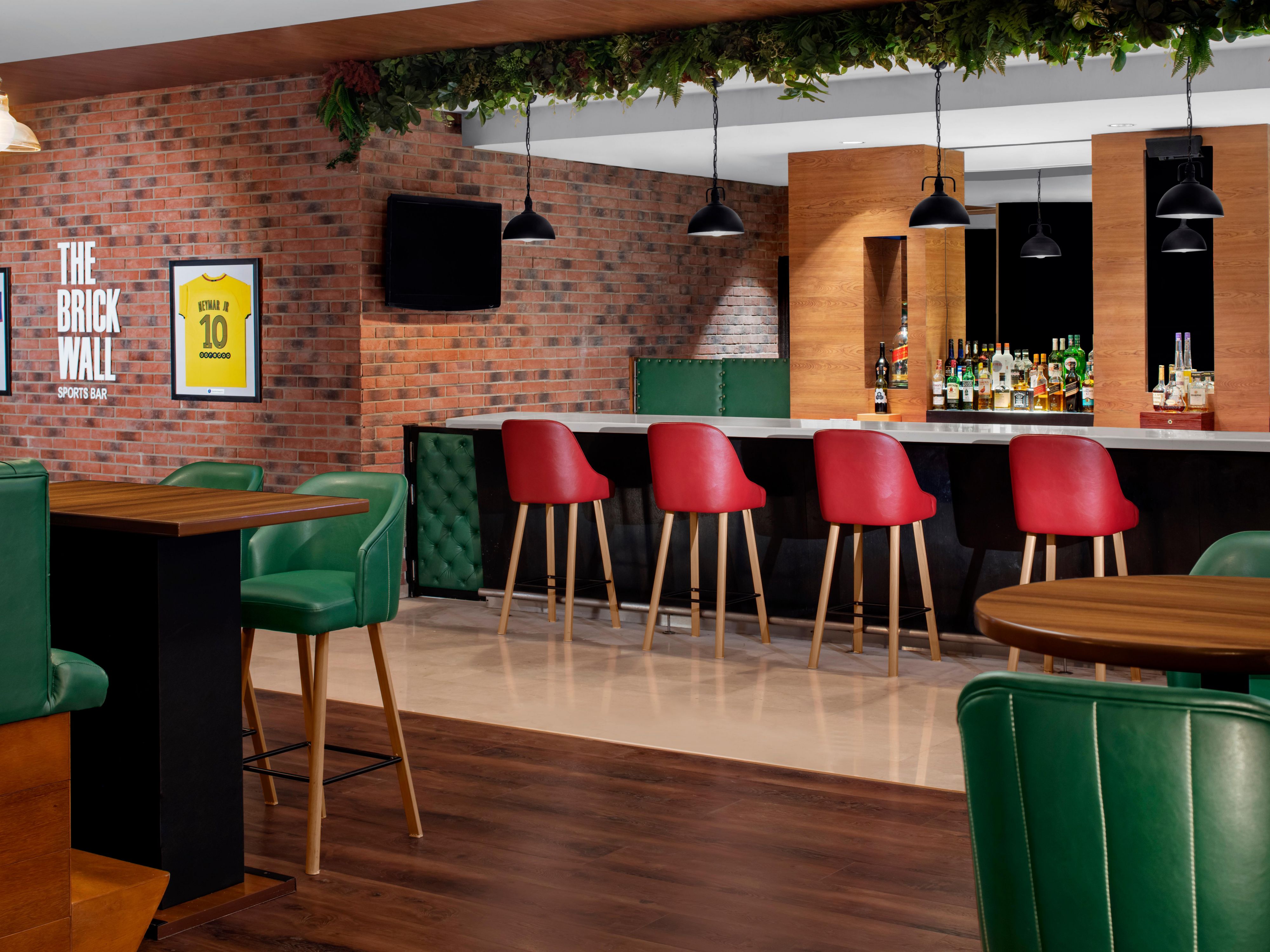During your stay, head down to The Brick Wall Sports Bar, where you can enjoy the latest football game or a delicious meal by the bar.