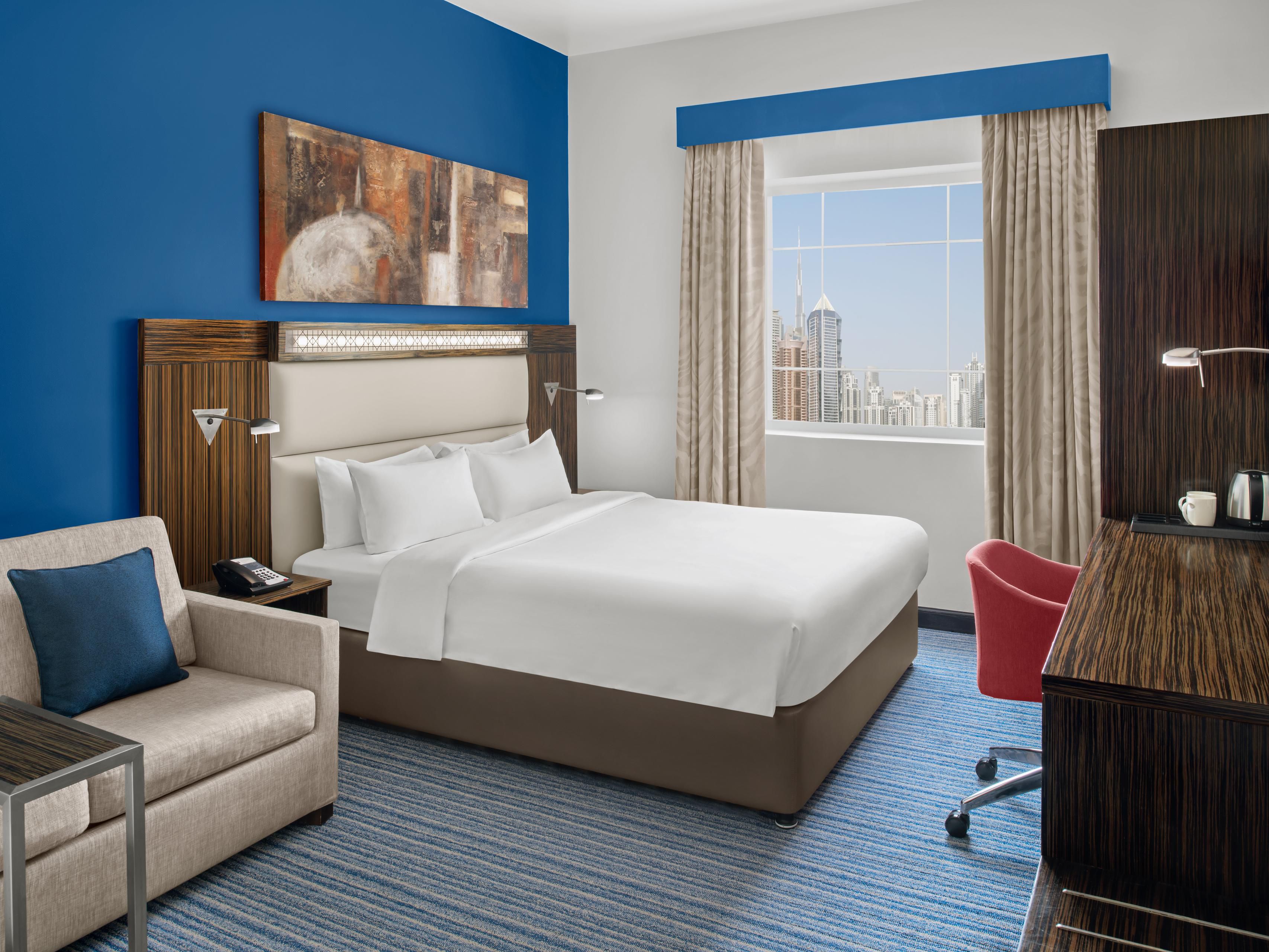 A king bed with sofa bed, perfect to stay with your little one