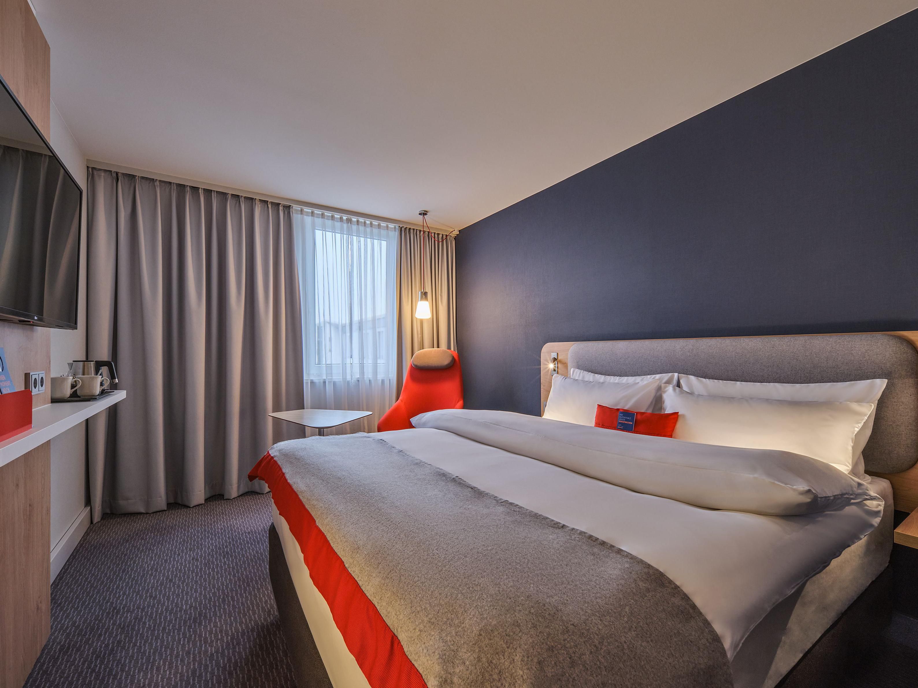 Drift off to sleep in our restful next-generation guest rooms with blackout curtains and comfortable beds. They're decorated in calm shades enlivened by pops of colour and all have Flatscreen TVs, bedside USB ports, and inclusive WiFi. If you're travelling with kids, all our family rooms have sofa beds.