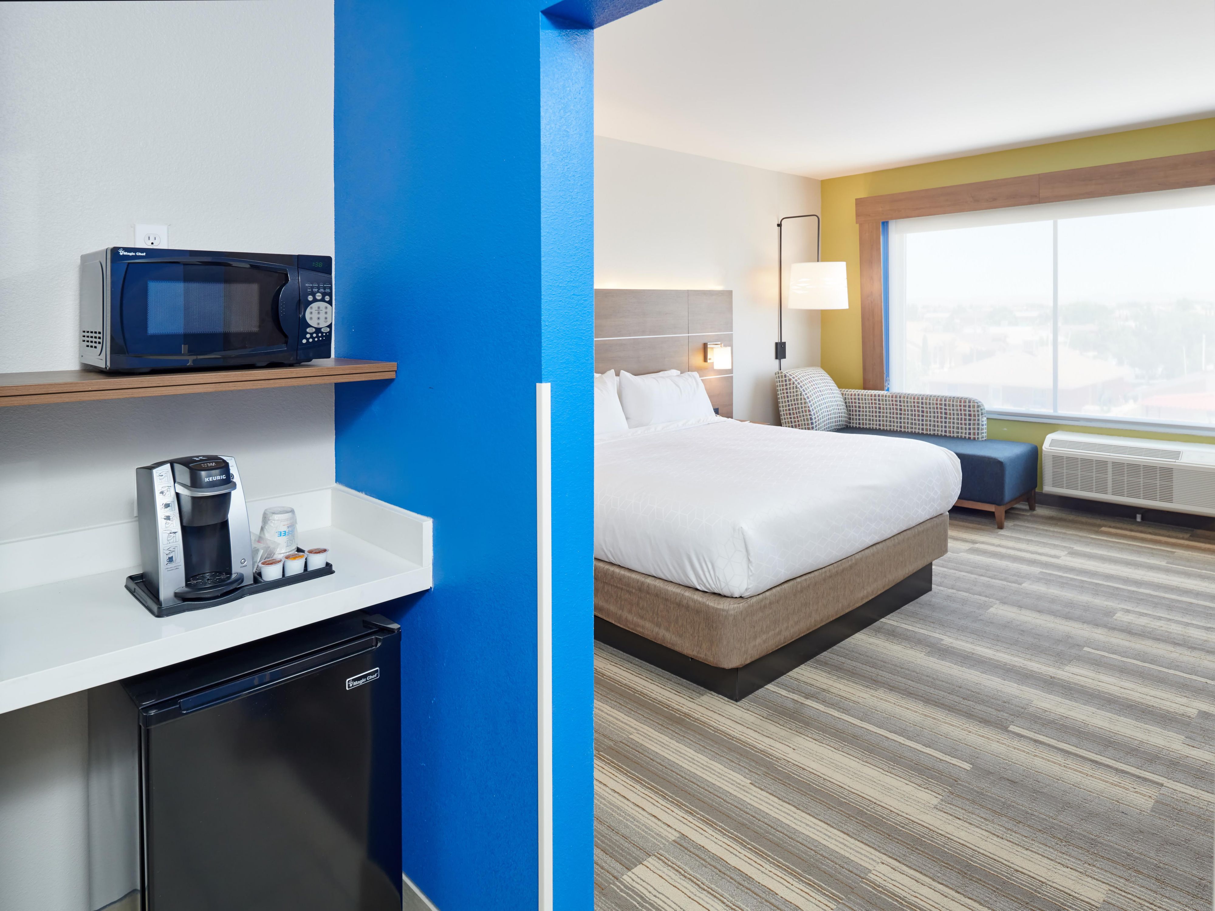 We have it! Our spacious suites are ideal for families or an extended stay. Each suite features a separate sitting area, a full workstation so that you can stay productive on the road, Keurig coffee maker, microwave, mini-fridge, and HDTV. All of our guest rooms have complimentary Wi-Fi and our full hot breakfast buffet each morning.