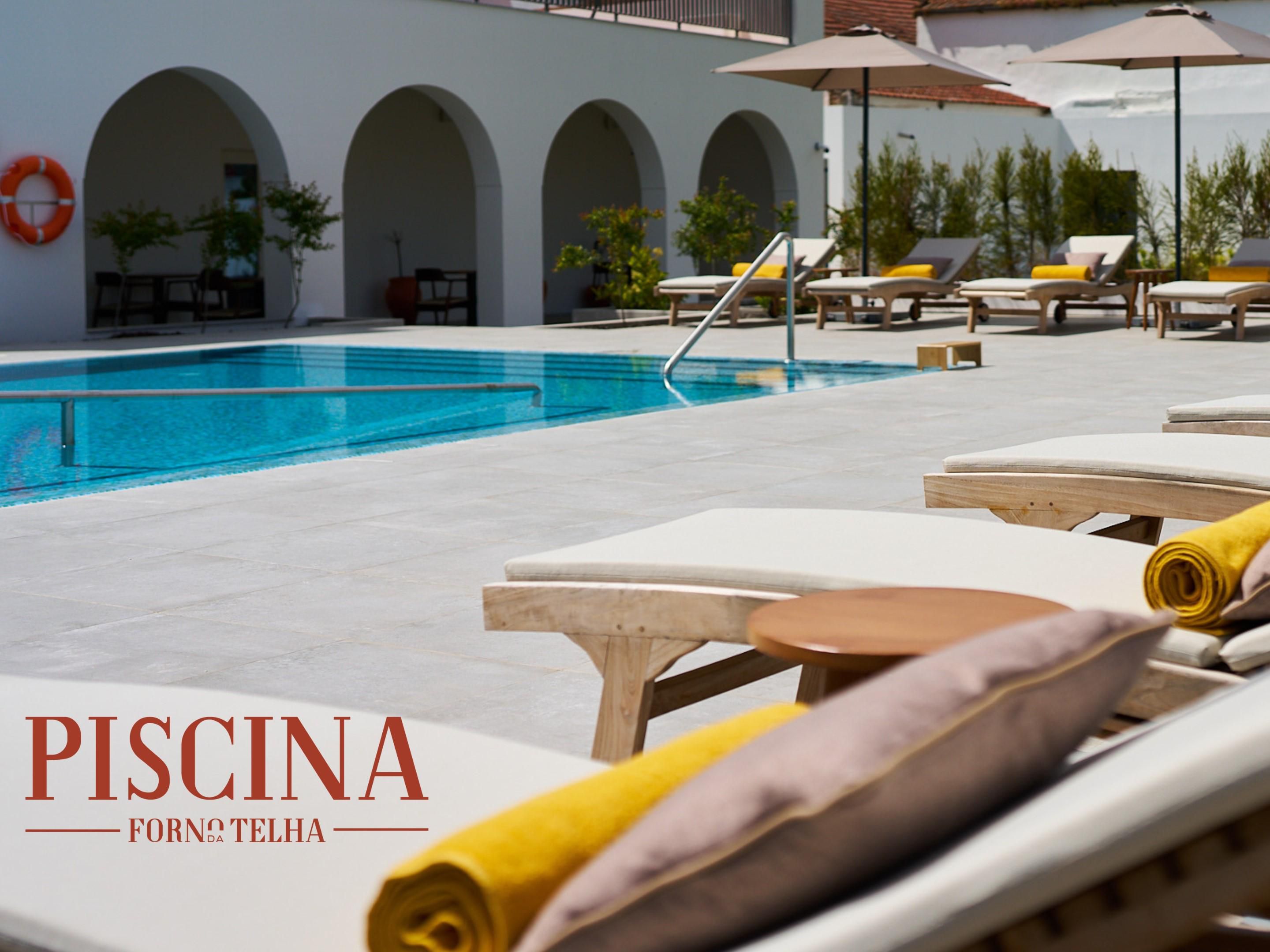 Indulge in relaxation this summer. Experience exclusive access to Forno da Telha pool club, with a towel and reserved bed for the day. Conveniently located steps away from the hotel and featuring poolside cocktail bar and restaurant, this is an ideal setting for unwinding in the sun. Reserve your pool package now for an unforgettable summer stay.