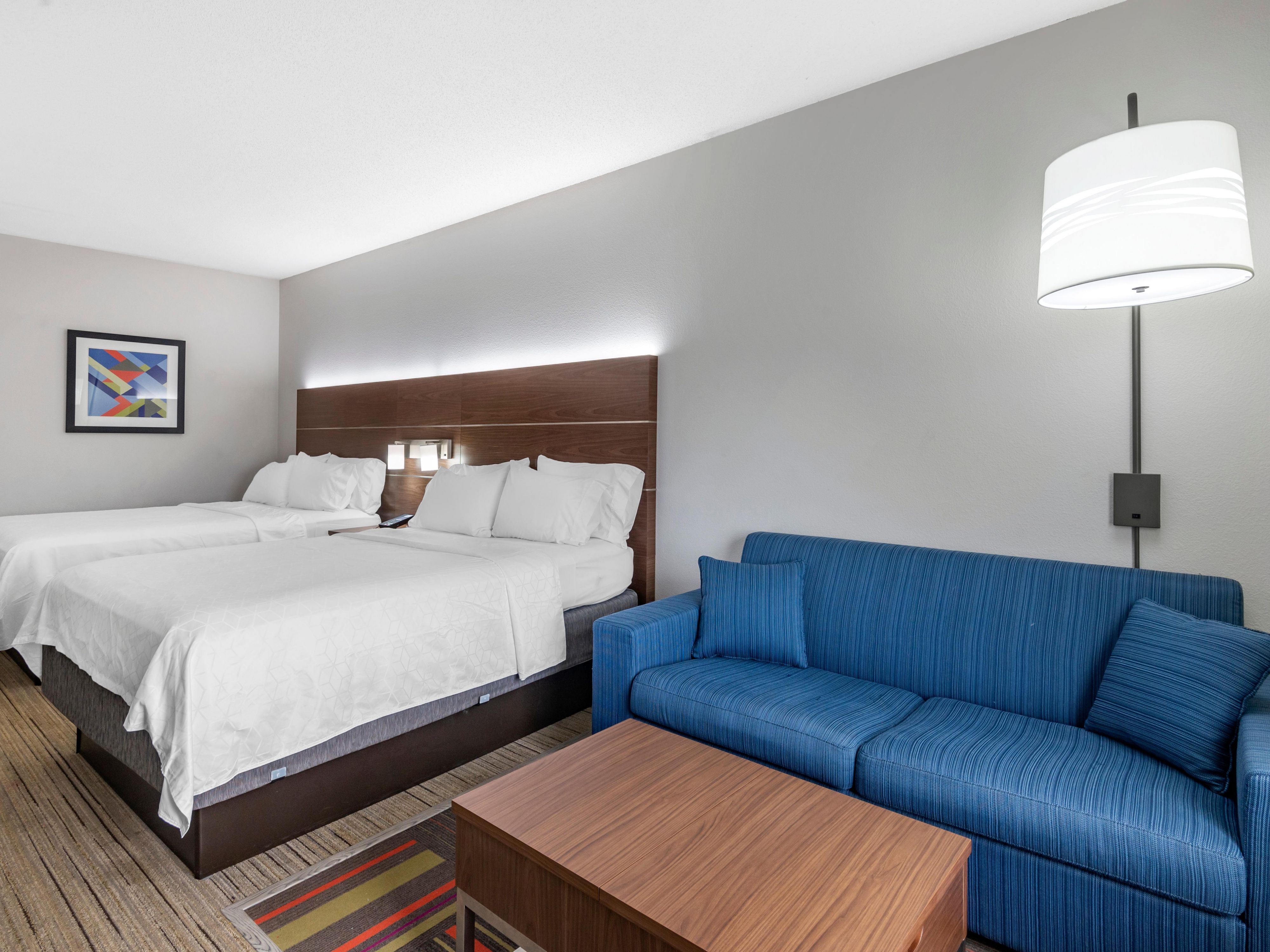 Relax in our spacious guest rooms, which are ideal for families and groups. Choose from one king or two queen beds or request a two-queen guest room with a sleeper sofa to accommodate six guests. Each room features a microwave, mini fridge, coffee maker, and free Wi-Fi, ensuring a comfortable and convenient stay.