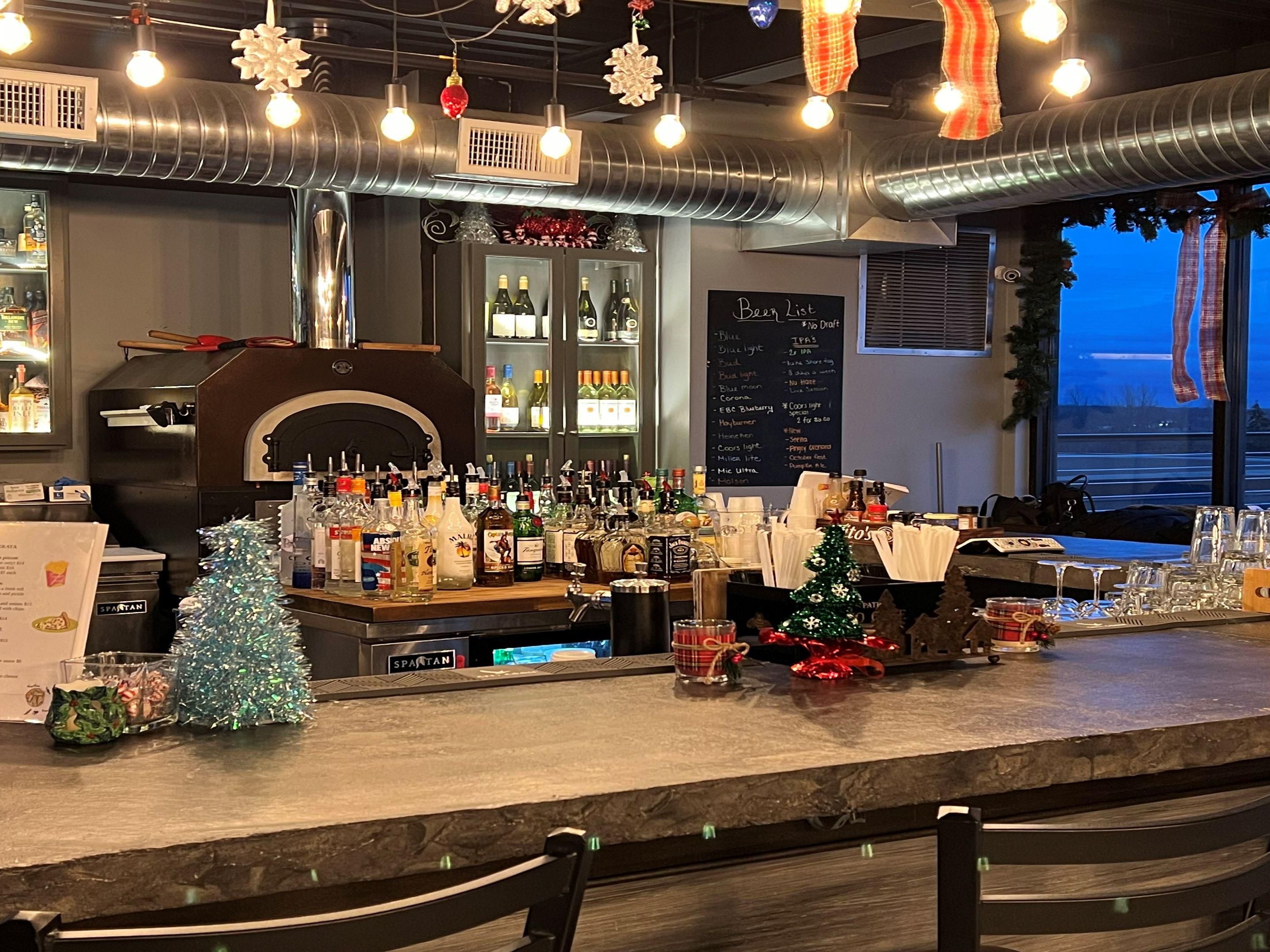 Located on the hotel rooftop with striking views of the area - Live music on Fridays - appetizers and light fare available and a full-service bar.