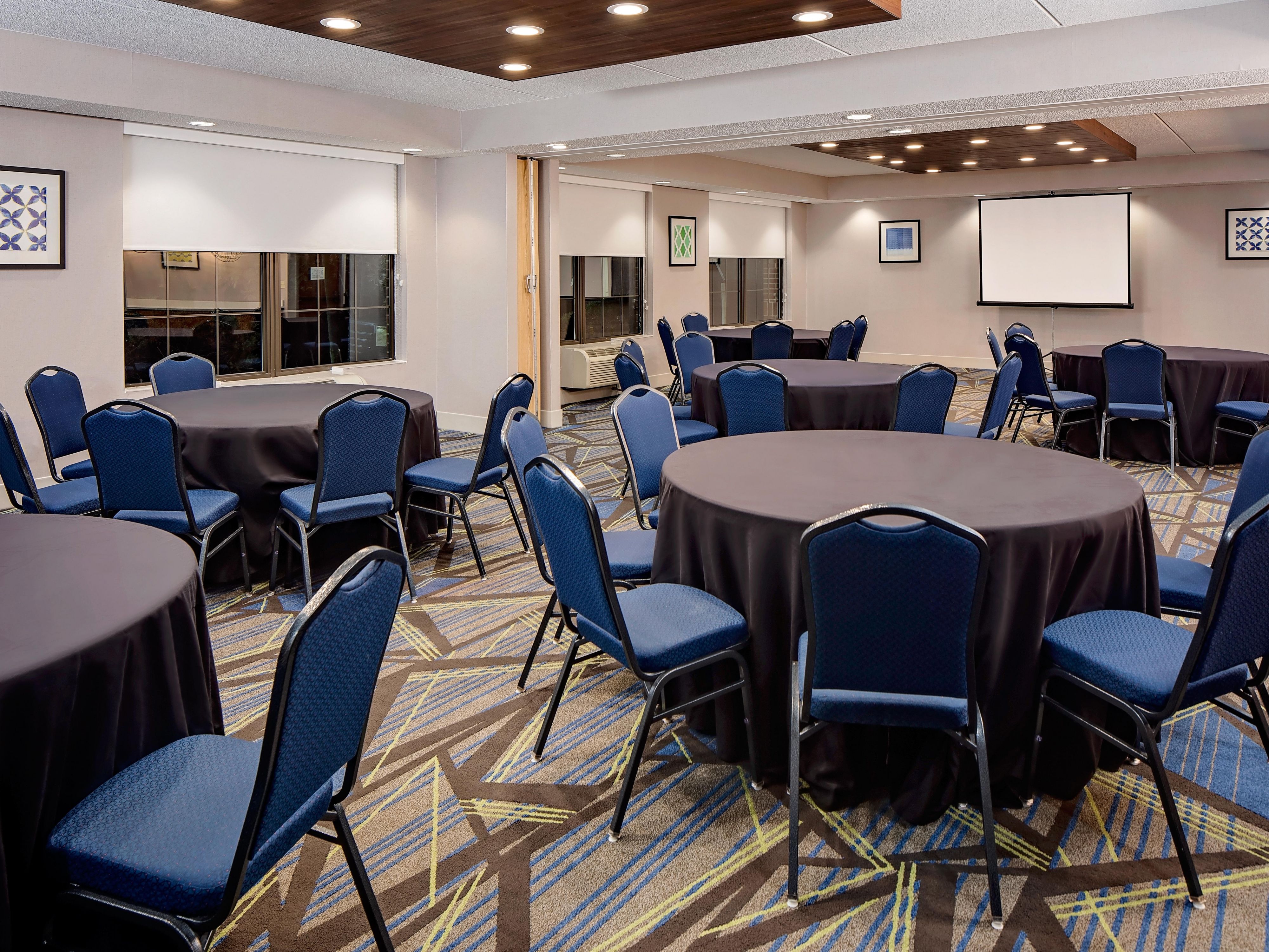 Our meeting and event space has over 1,250 square feet to host your event. Space hold up to 60 guest. We offer the flexibility of bringing in your own food or hiring your own caterer. Contact our sales office cscott@twintierhospitality.com for more information! 