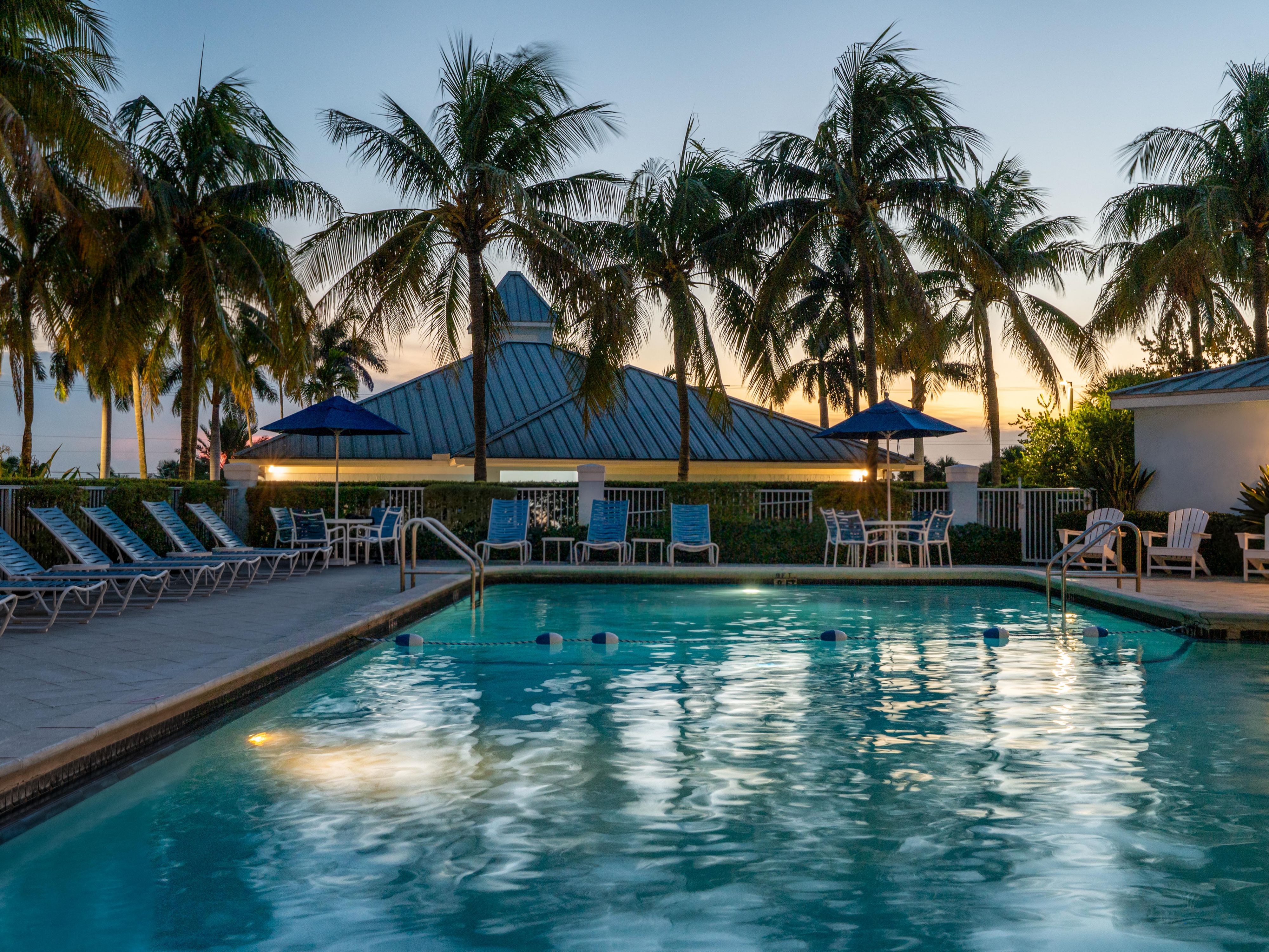 Outdoor swimming pool at dusk