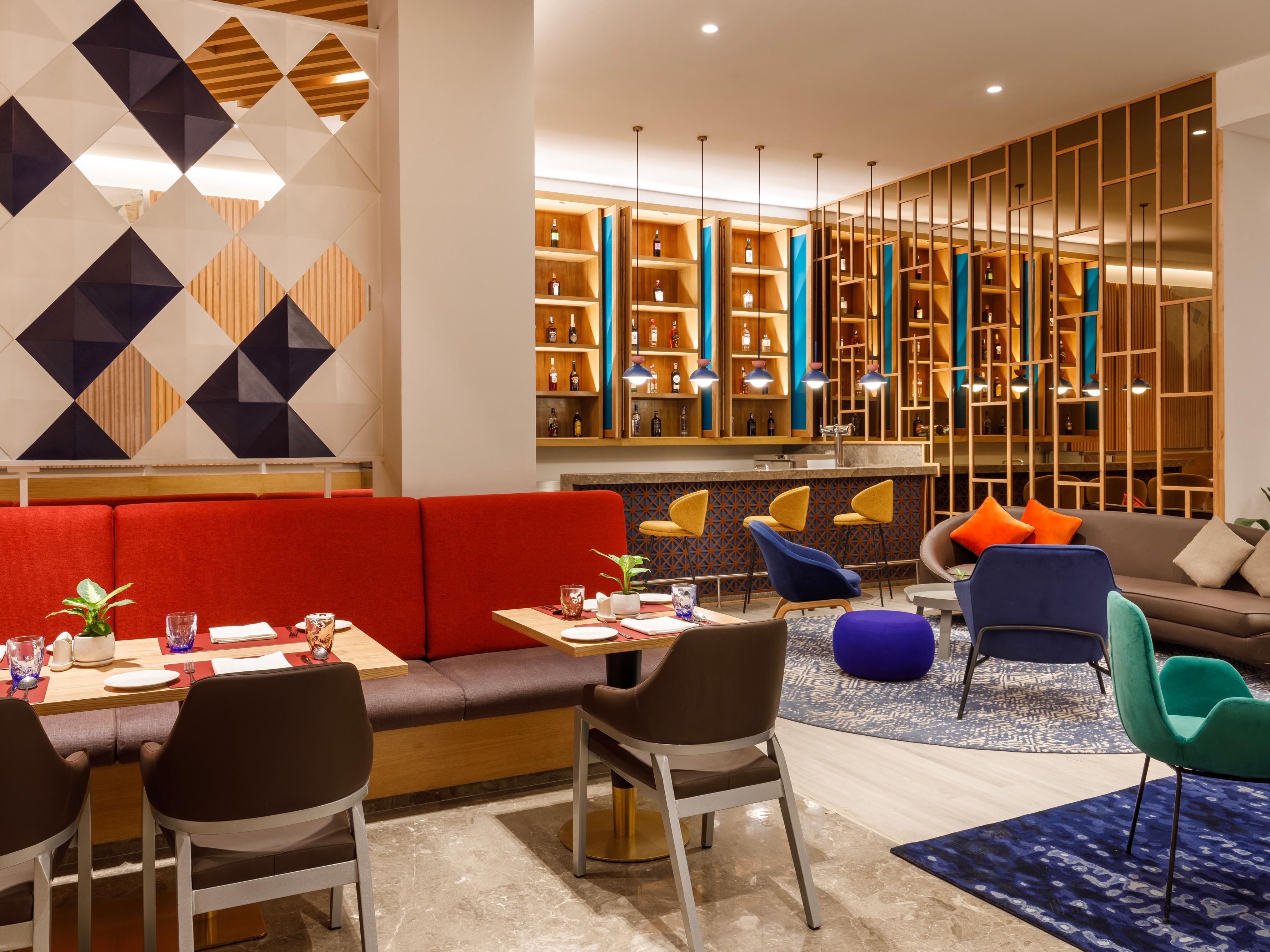 Grab your Free Breakfast or pick Grab & Go options, while culinary favourites await at our Express Café & Bar. Recharge anytime with a diverse all-day menu. Whether you dig vibrant indoor dining or alfresco delights, we've got the flavour-packed fuel you need.