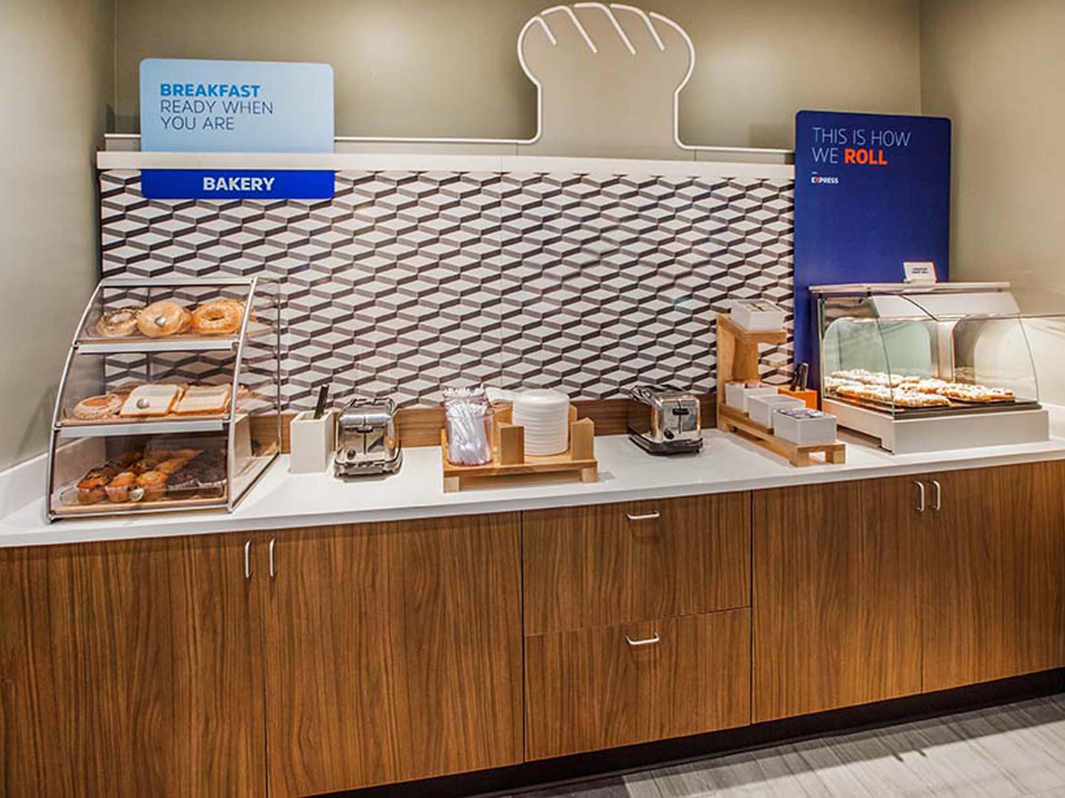 Start your morning with our free hot breakfast, featuring fresh options including eggs, breakfast meats, pastries, and our signature cinnamon rolls.