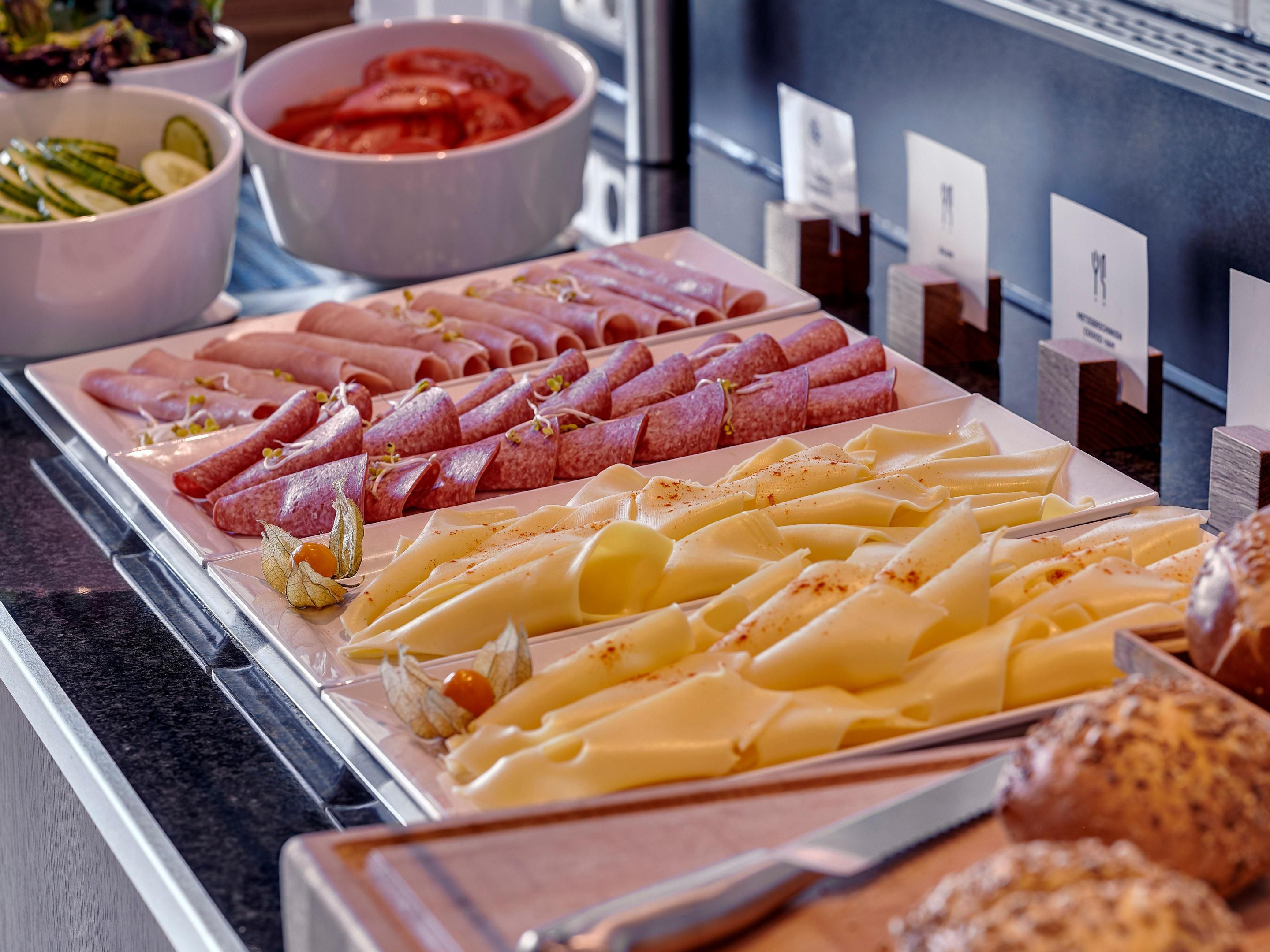 Fuel up for the day with the included continental Express Start™ Breakfast buffet in the Great Room. The spread includes pastries, cold cuts, hard-boiled eggs, and more.