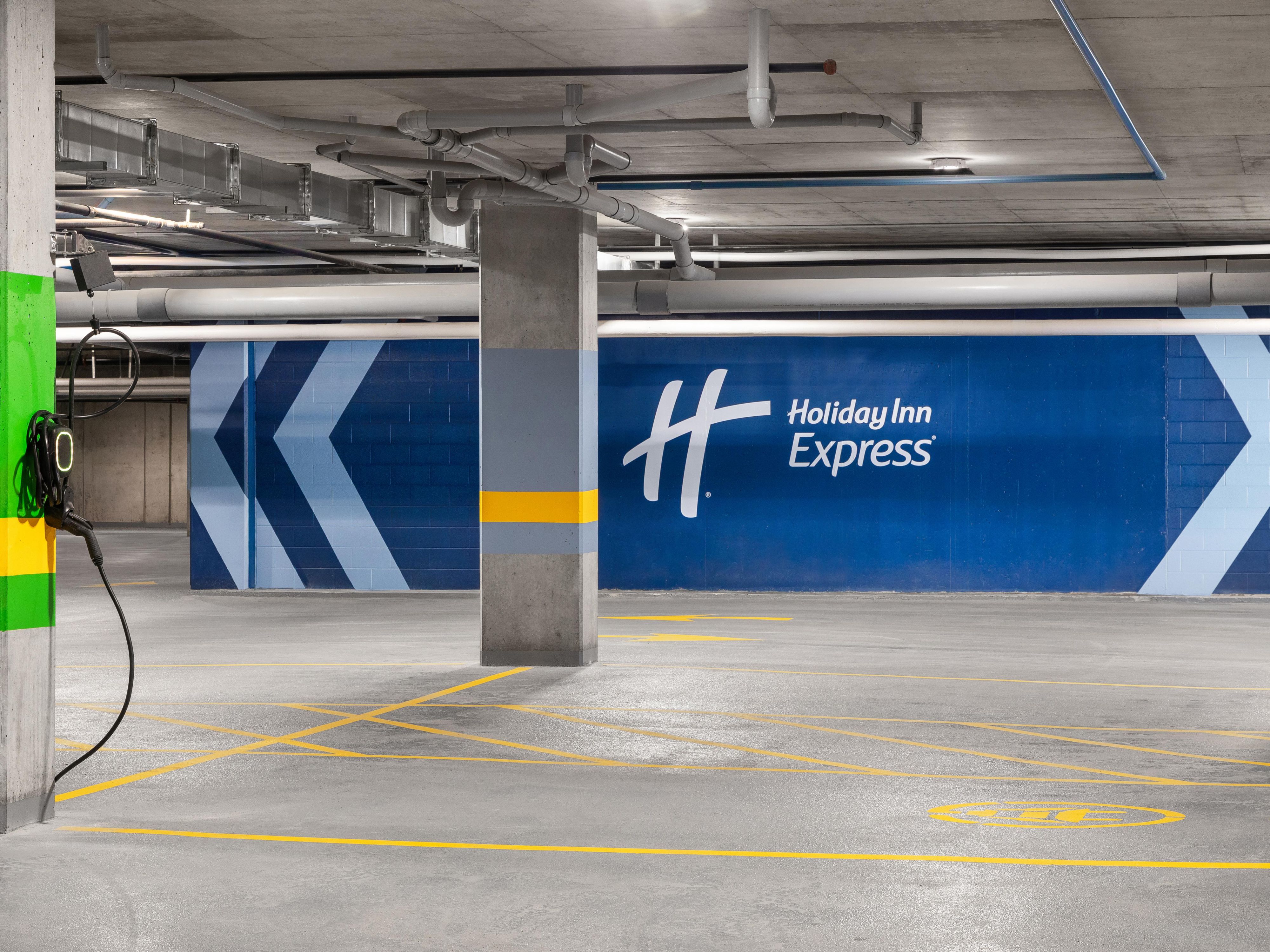 Our Montreal YUL airport hotel offers indoor parking with large spaces, perfect for both short and long-term stays. Enjoy peace of mind with easy access to your vehicle in a spacious, well-lit area. Committed to sustainability, we also provide electric vehicle charging stations, making us the ideal choice for eco-conscious travelers.