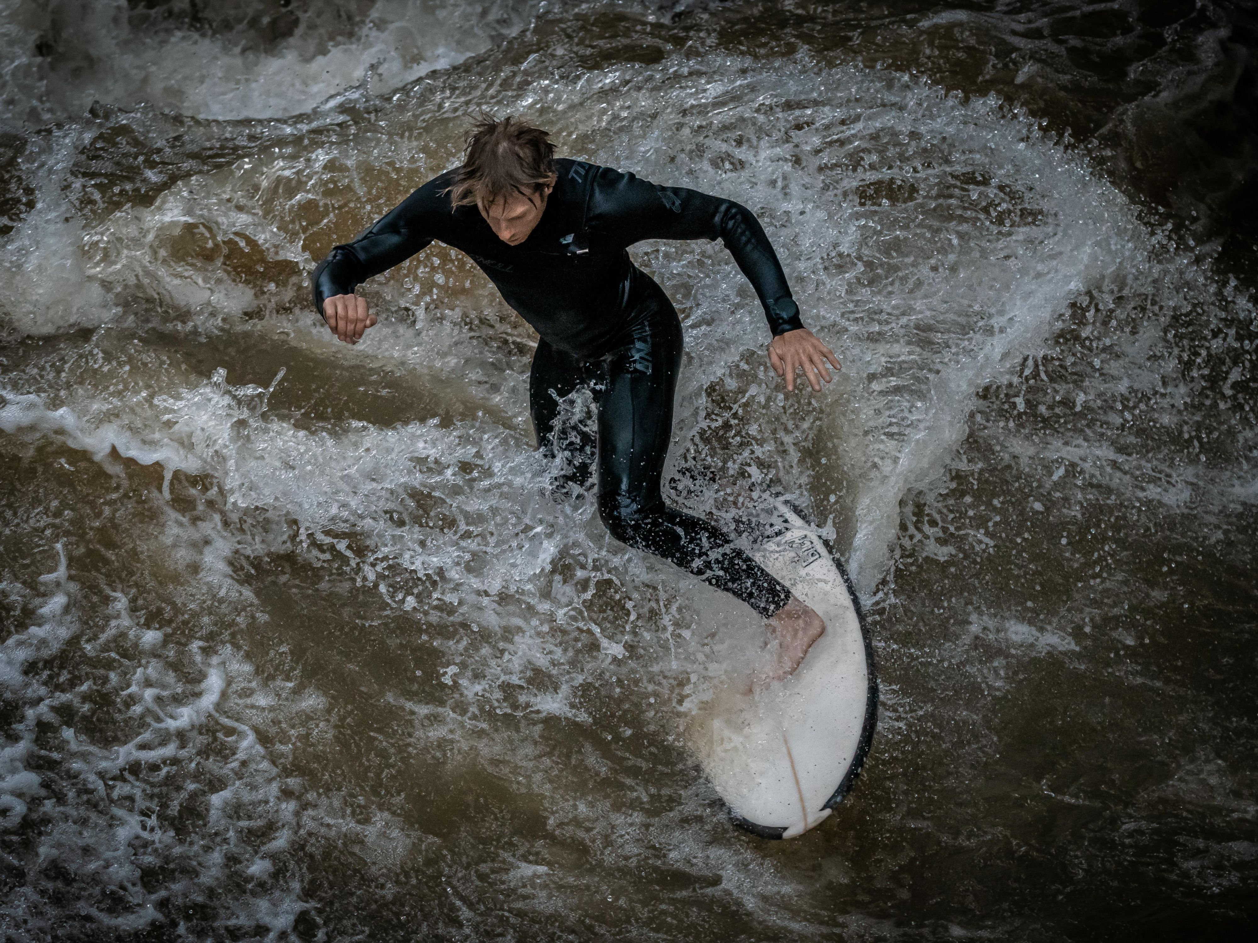 Whether you get on a surfboard yourself or just watch the pros, a visit to the Eisbach wave in the English Garden is always a highlight!