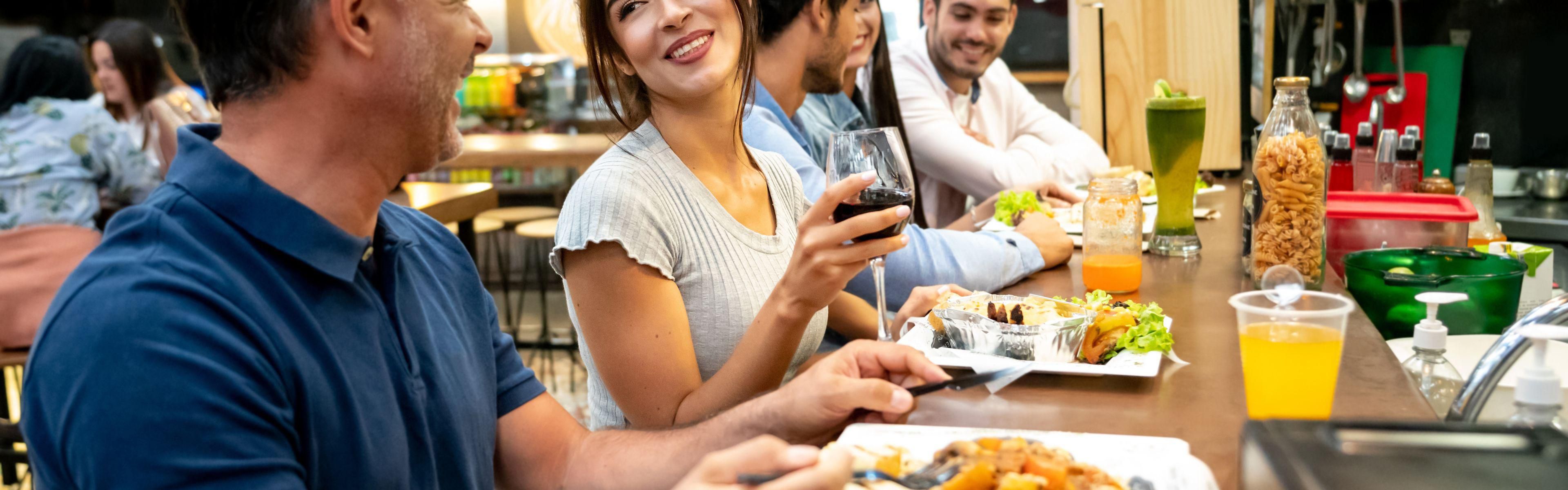 Food hall with eateries like pizza, ramen, poke, breweries, etc.
