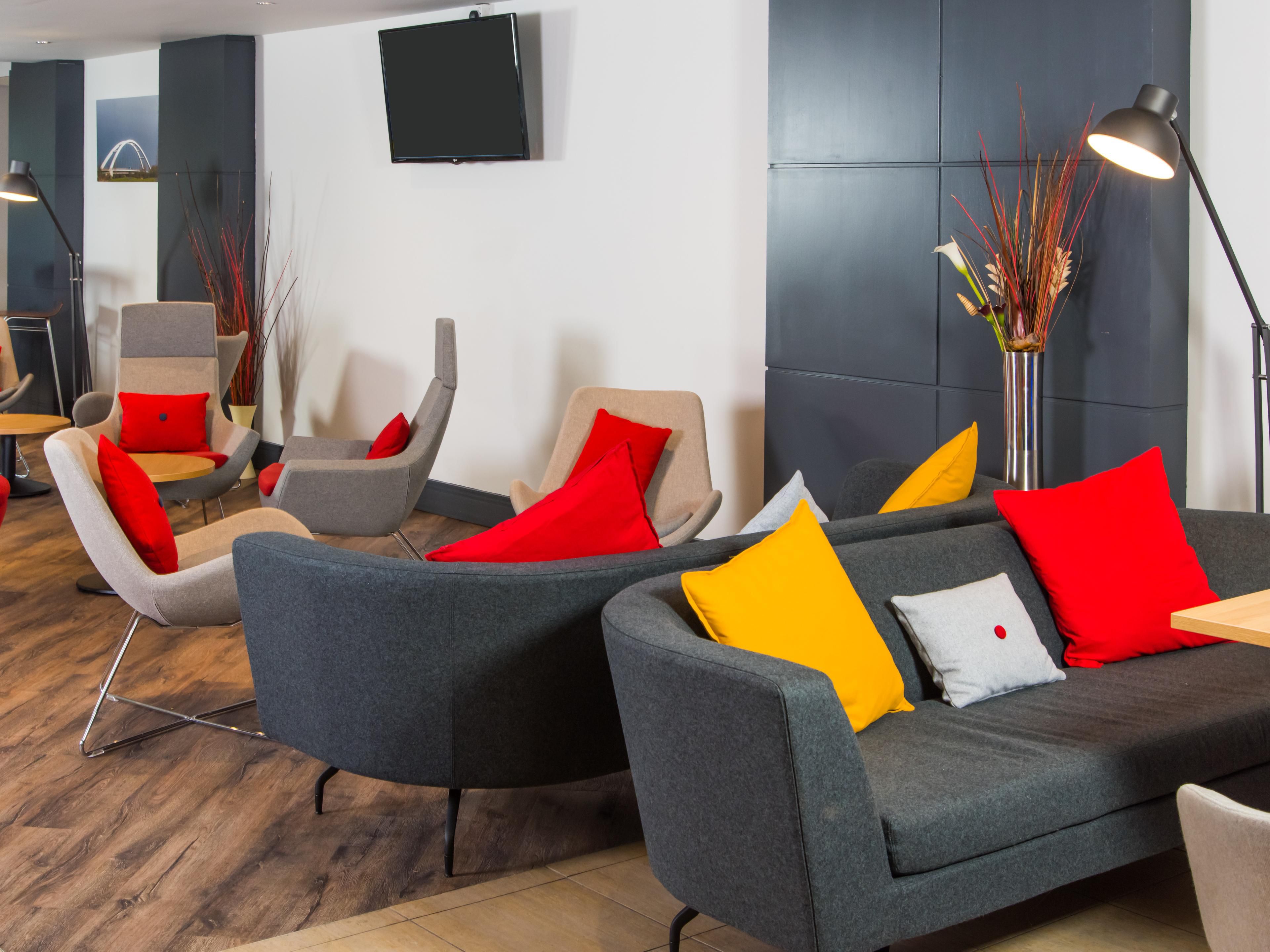 Relax in the comfy seats in our modern lounge.