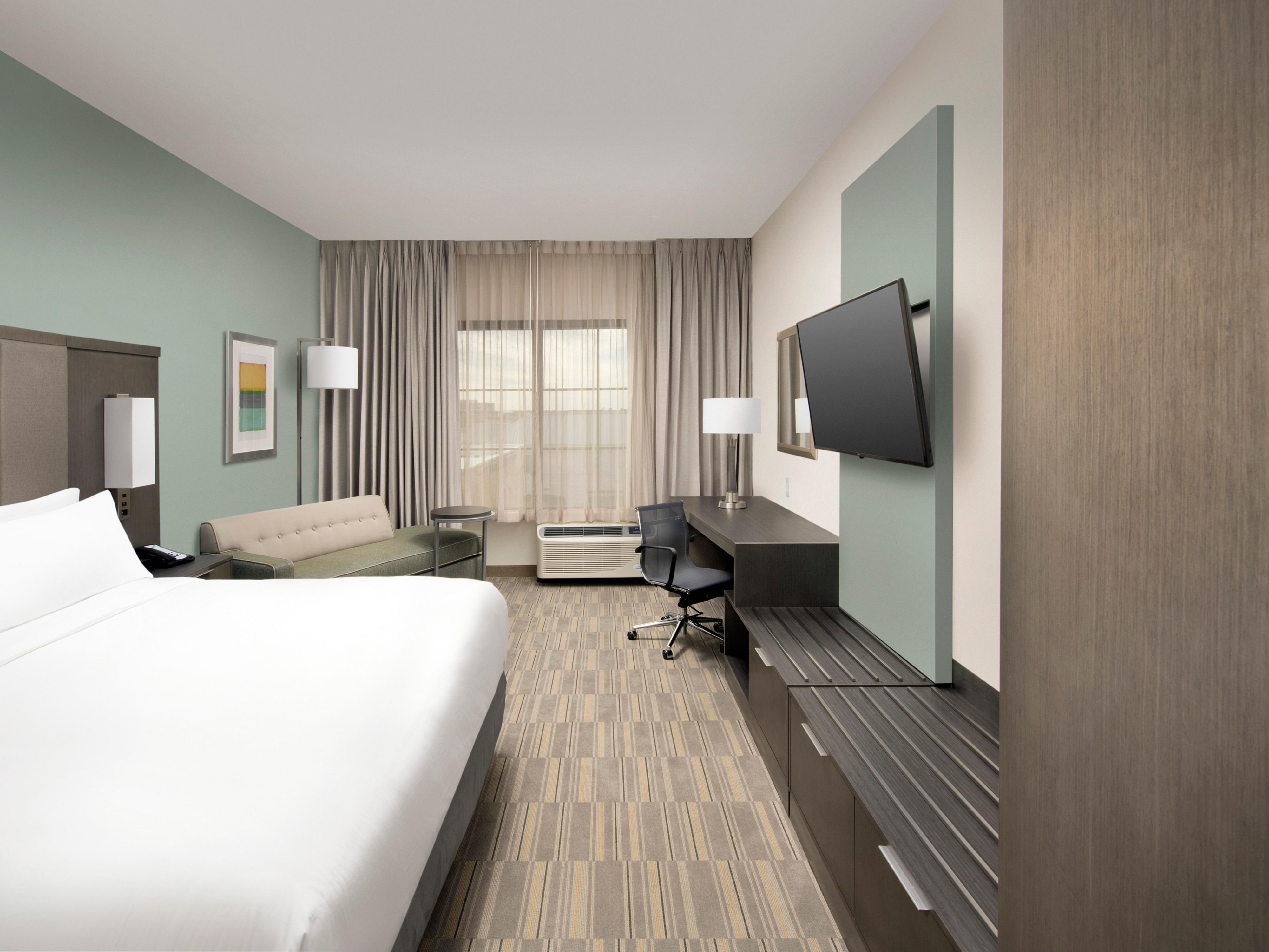 Enjoy a modern room with a pillow top king bed and 42-in HD TV