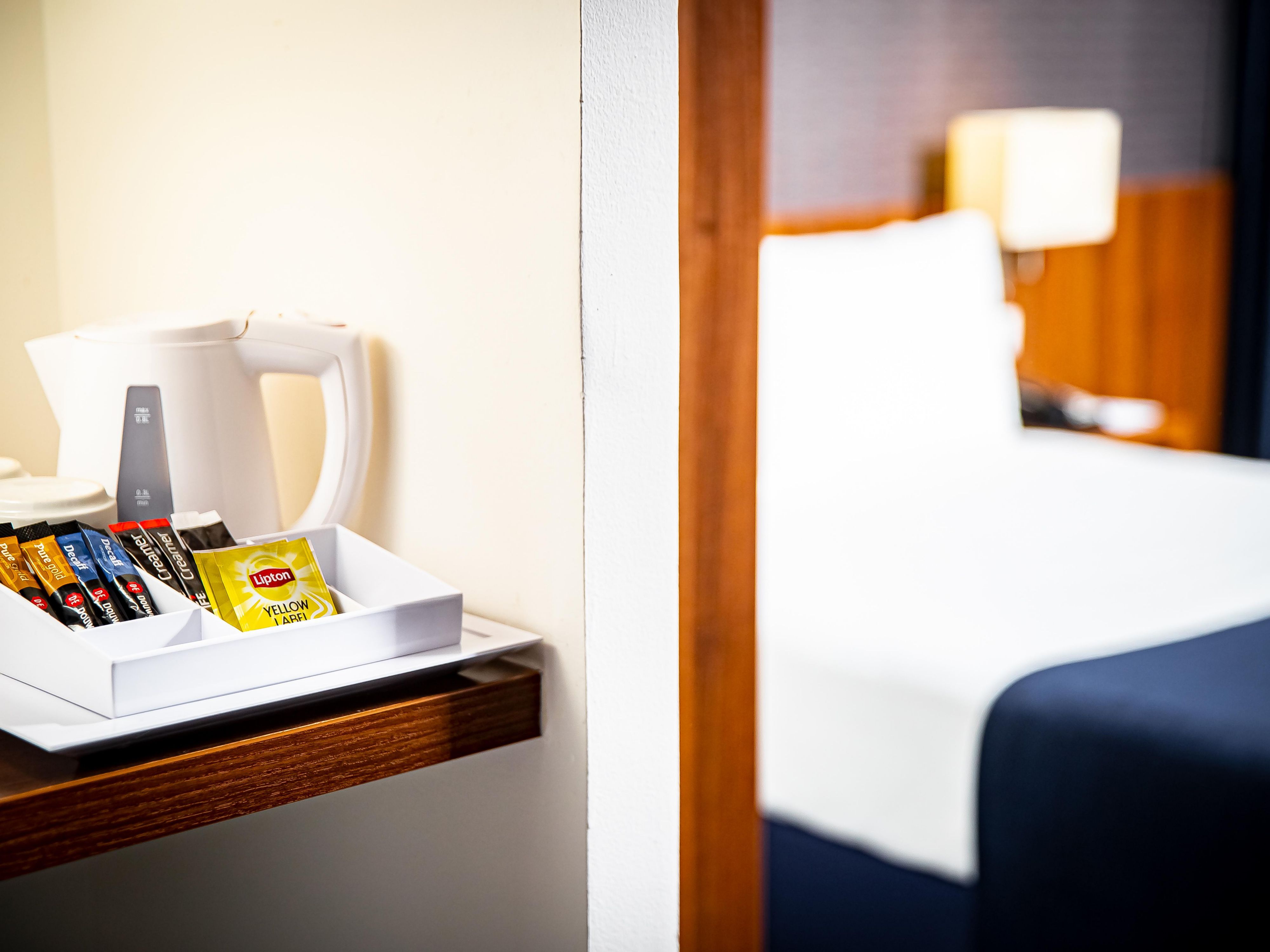 In our modern guest rooms, coffee and tea are available for you.