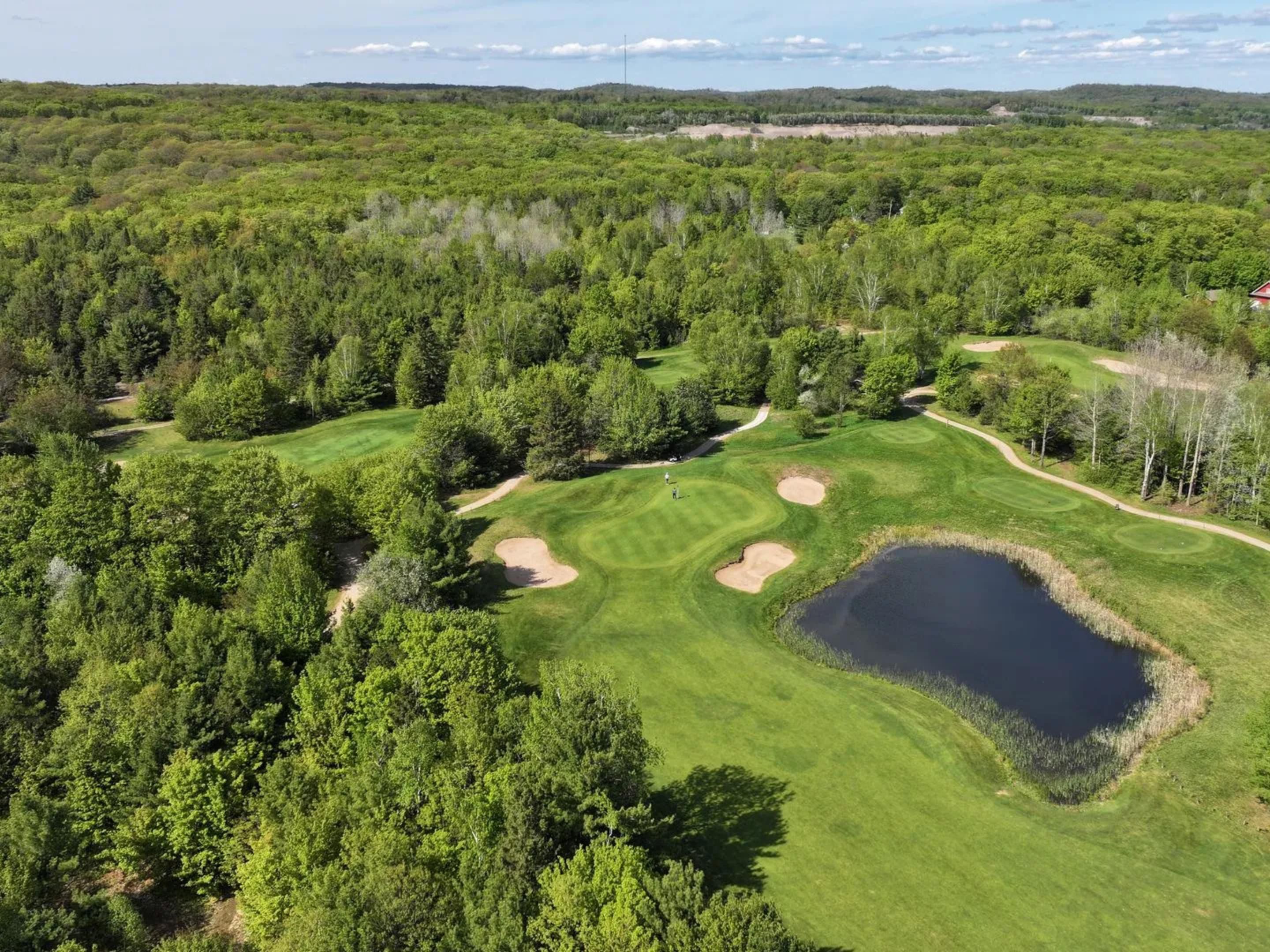 Crimson Ridge Golf Course offers a scenic and challenging 18-hole layout with rolling fairways, elevation changes, and sweeping views. It’s a must-play for golfers looking to pair their round with Northern Ontario beauty.