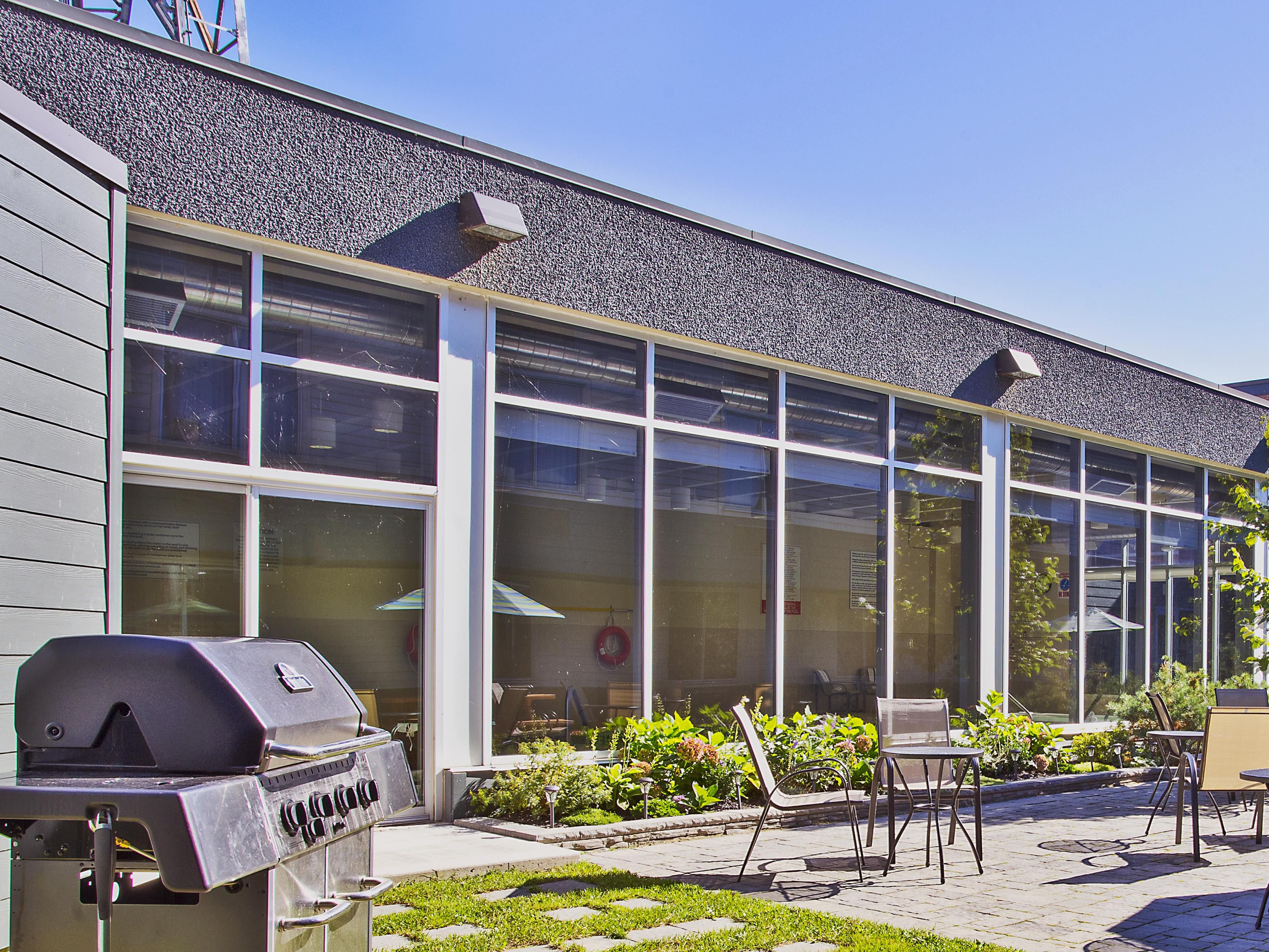 Step outside to our peaceful courtyard. It's a relaxing outdoor space ideal for enjoying your morning coffee, taking a break between meetings or unwinding after a day of exploring the Soo.