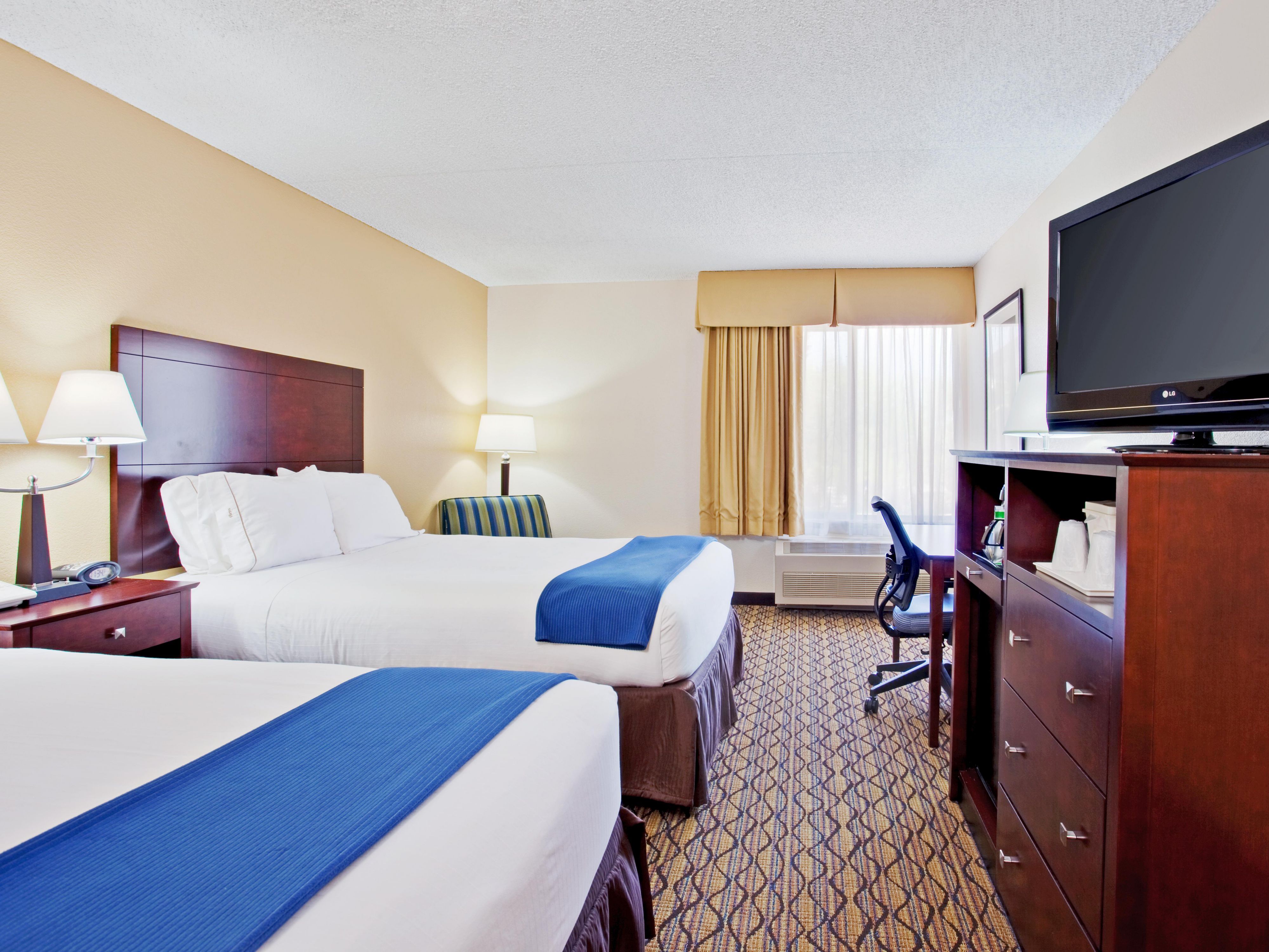 Book a room with Two Queen Beds perfect for friends & family.