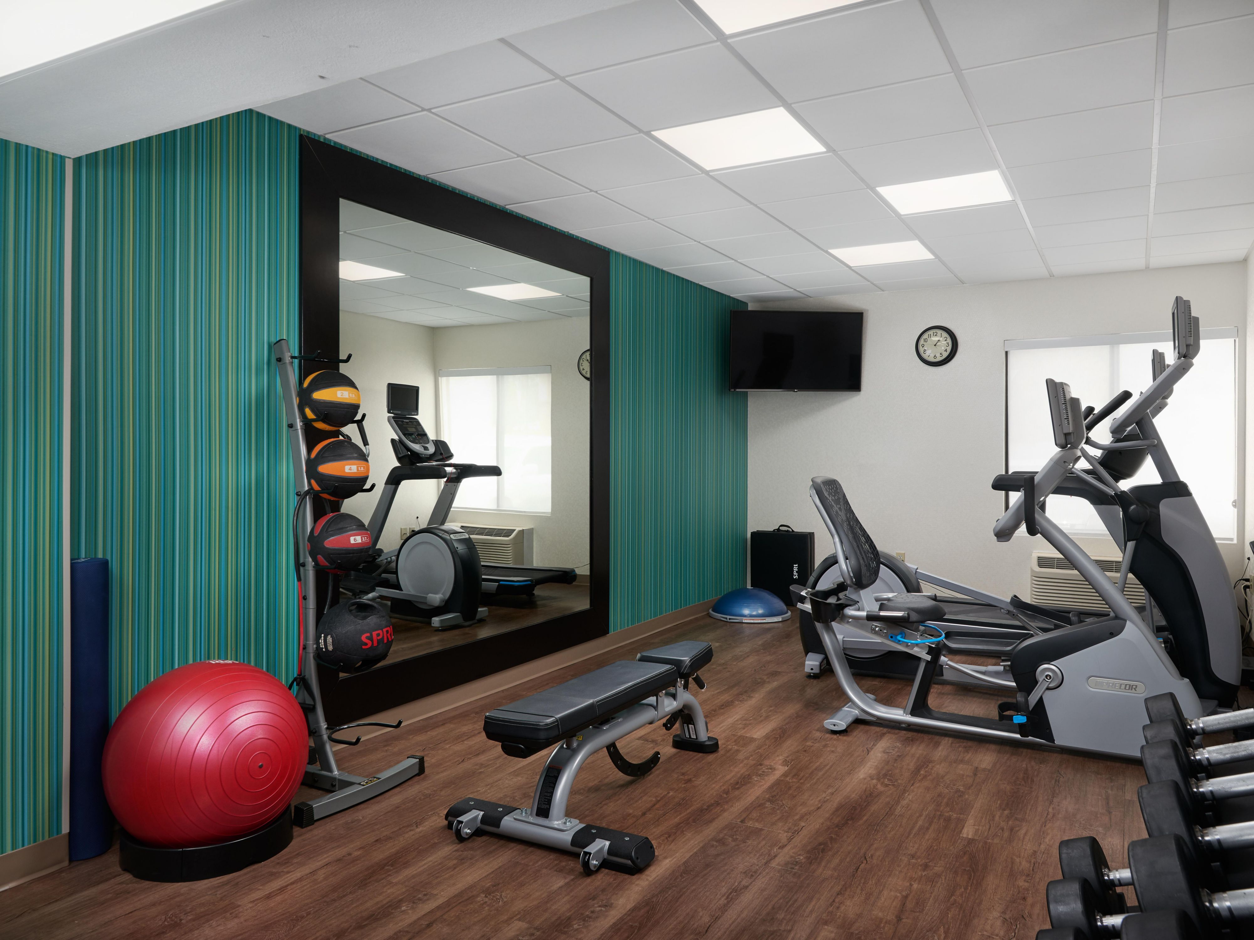 Stay active during your stay at our modern fitness center, open daily, 24 hours. Enjoy elliptical machines, free weights, stationary bicycles, and treadmills—all complimentary so you can maintain your workout routine with ease.