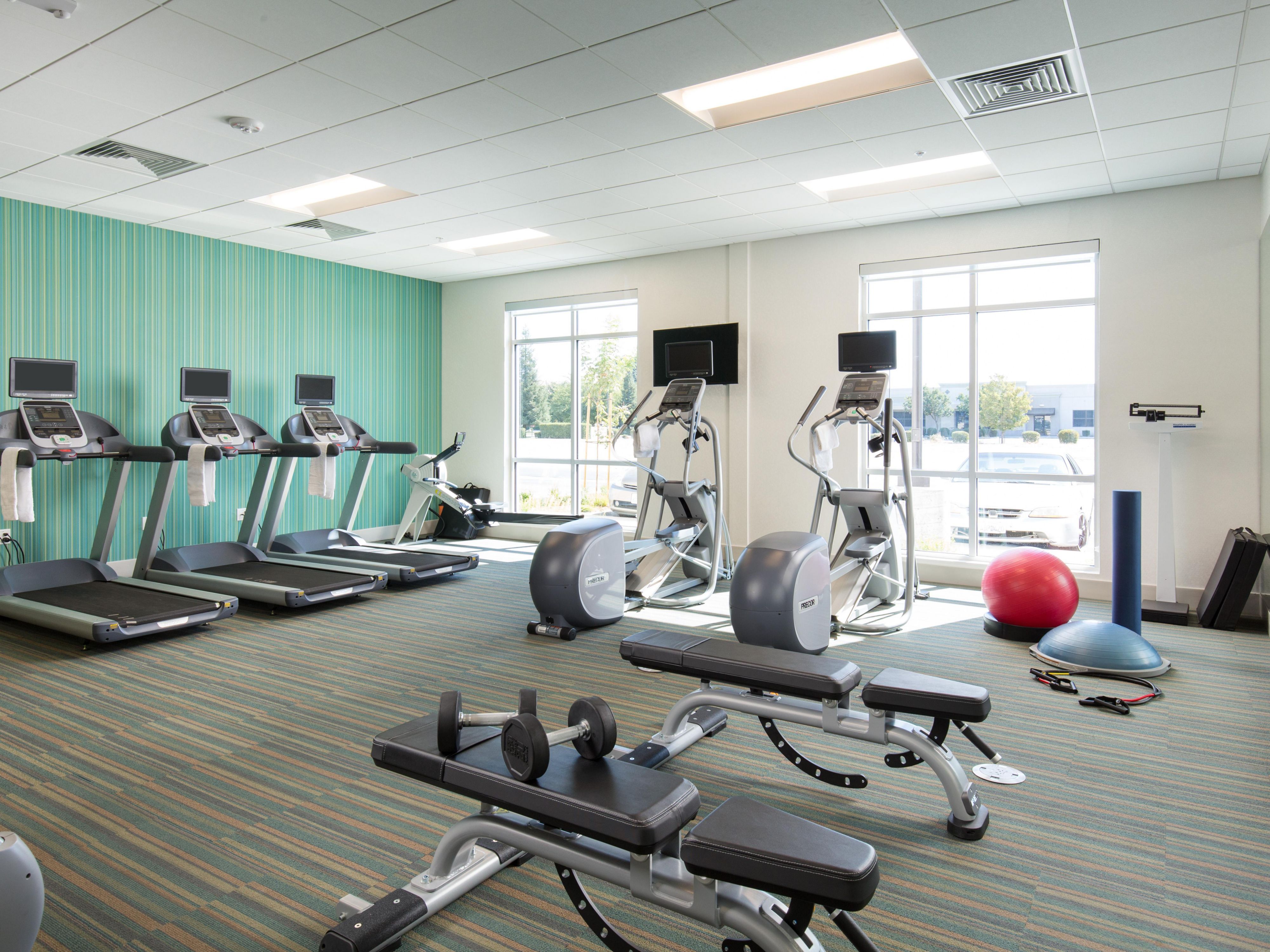 Turbocharge your energy in our modern fitness center with state-of-the-art strength training equipment, yoga balls, and cardio machines.