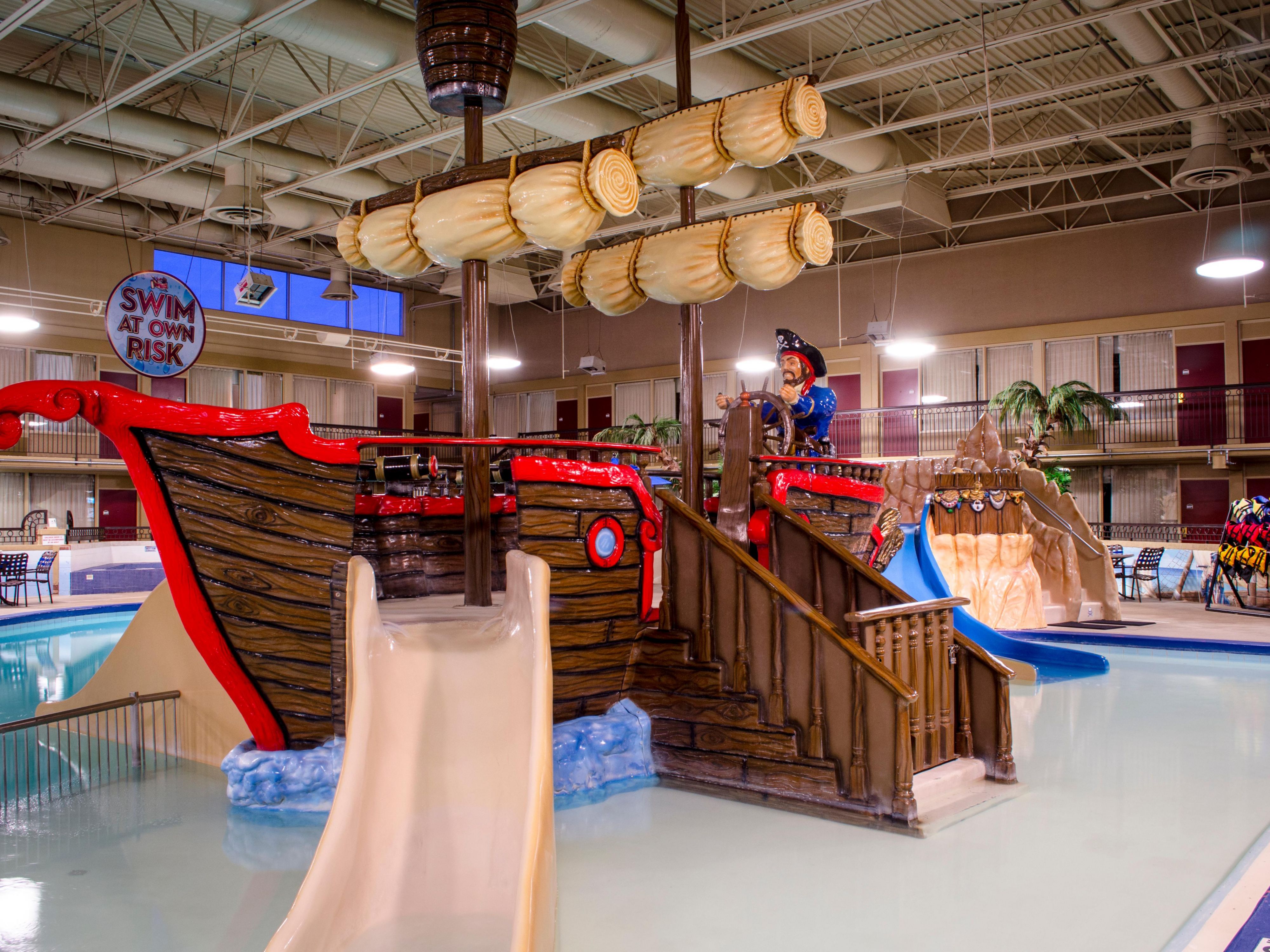 Take a dip in our immersive water playland, Shipwreck Bay! Featuring thrilling slides, a pirate ship, and a tiki bar - there's something for the entire family to enjoy. Book a pool access room so you don't miss a minute of fun! Wristbands required for pool area entry. 6 wristbands per room.