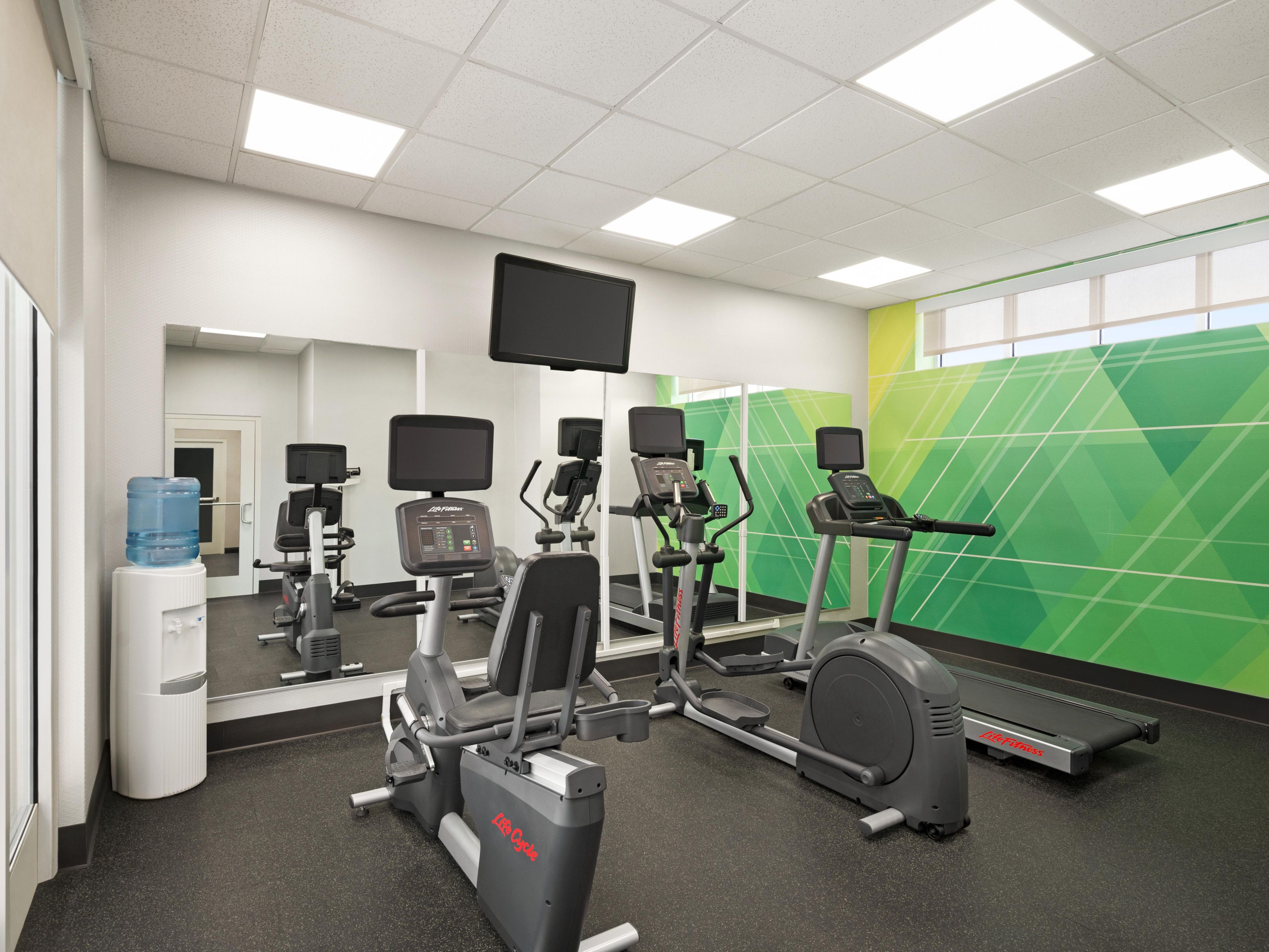 Stay active and energized in our 24-hour Fitness Center designed to fit your schedule. Whether you prefer a cardio workout or a strengthening and toning session with free weights and balance balls, our fully equipped facility provides everything you need for a satisfying workout day or night.