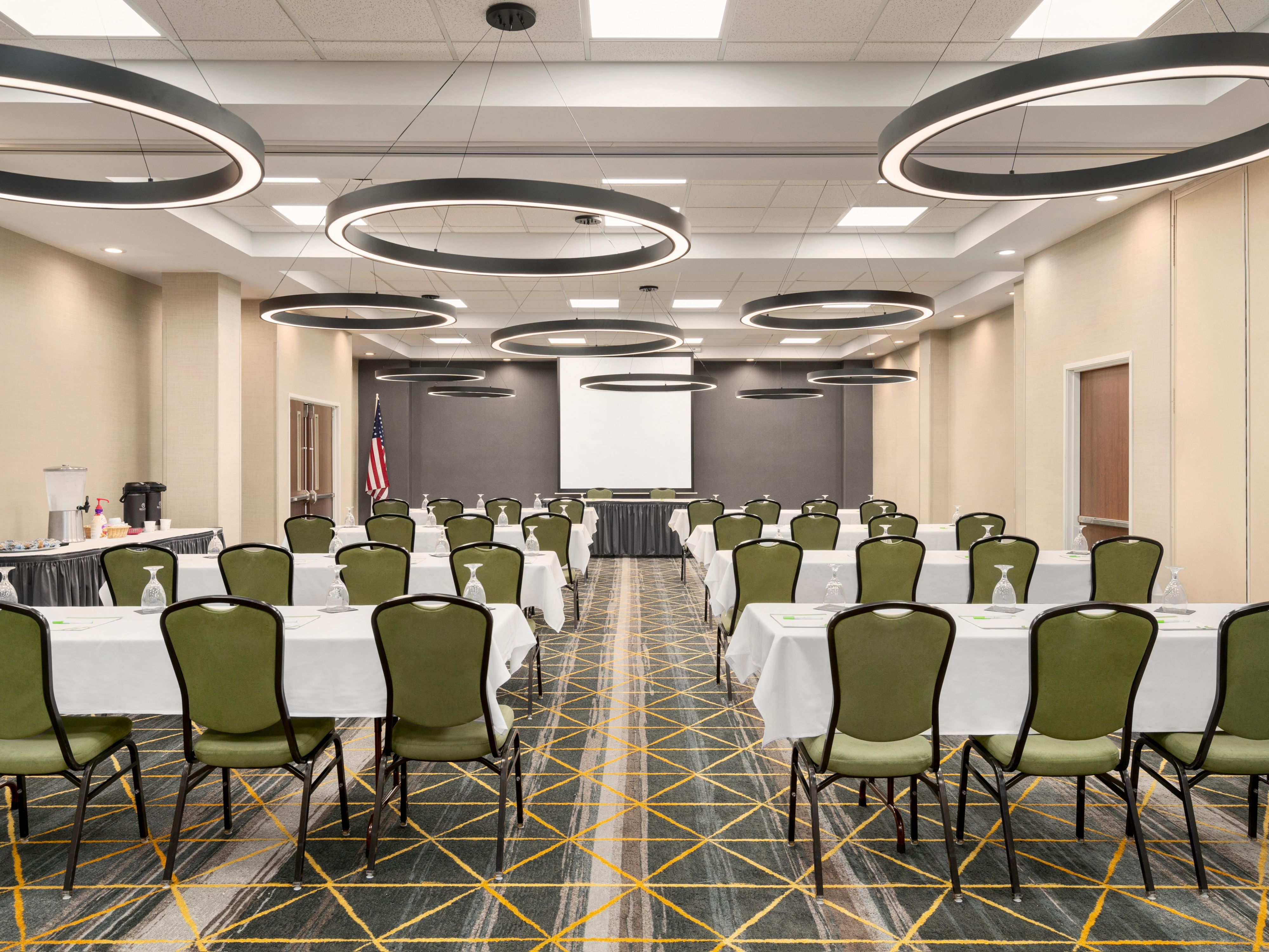 Elevate your events in our versatile meeting space, designed for success. Enjoy complimentary use of a podium, microphone, projector, and screen, ensuring seamless presentations and engaging discussions. With flexible layouts and modern amenities, our venue is perfect for conferences, workshops, and gatherings.