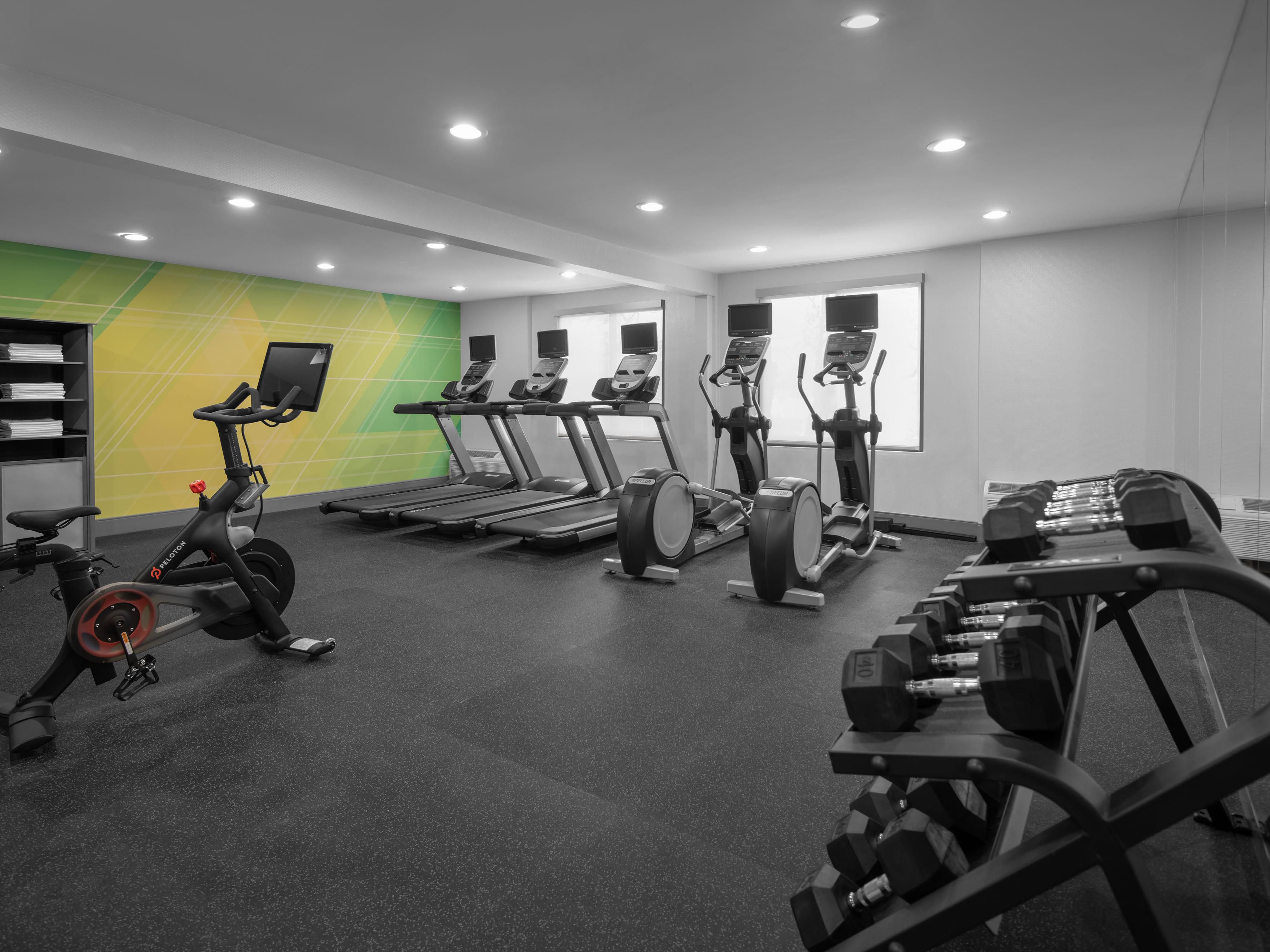 Get your sweat on and step into our newly renovated 24-hour Fitness Center, which features a Peloton bike, treadmills, ellipticals, medicine balls, as well as universal and free weights.