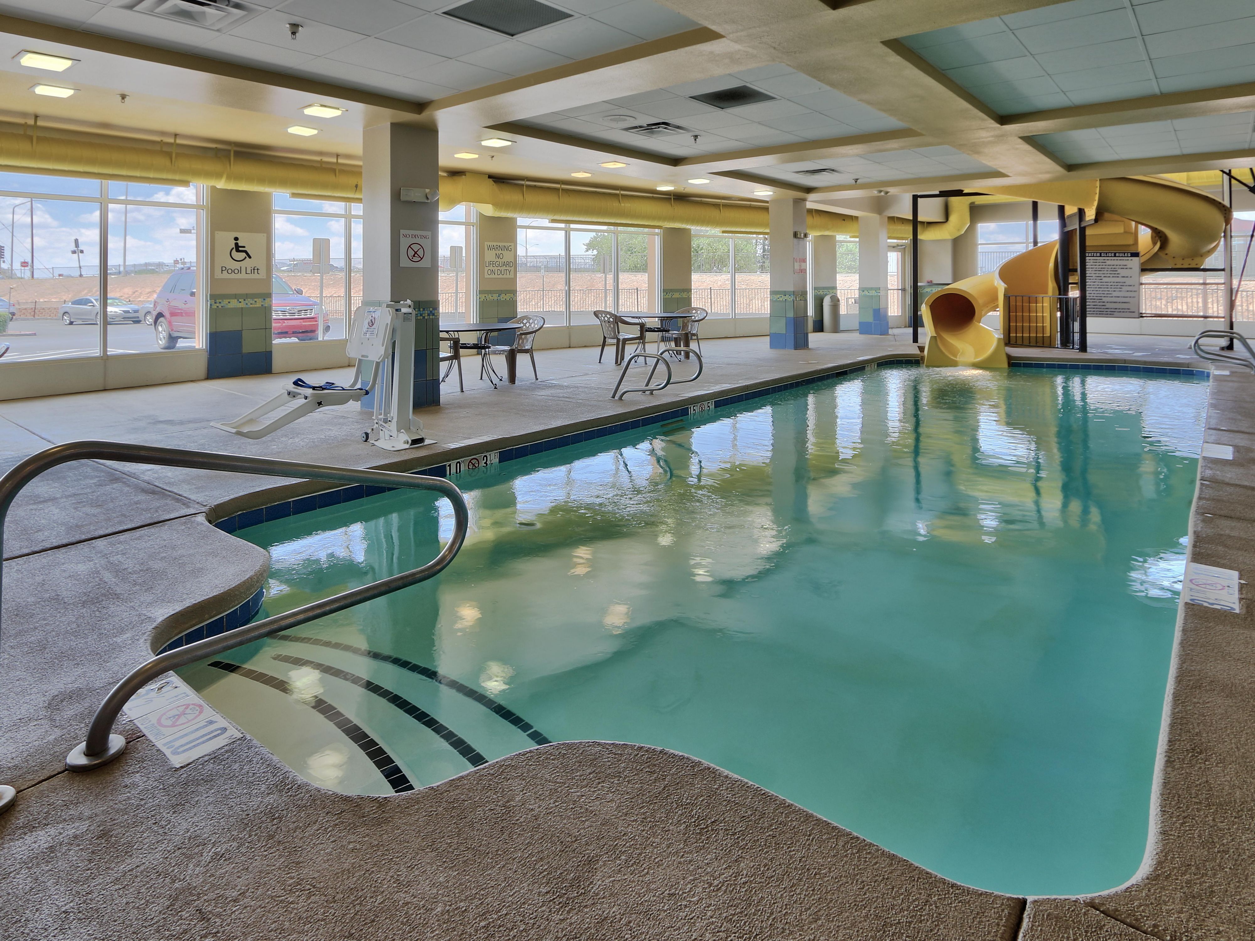 Enjoy a refreshing and relaxing experience at our indoor pool, perfect for unwinding after a long day. With comfortable seating areas, you can relax and rejuvenate. Our waterslide is open limited days and hours. Please call the hotel directly to inquire.