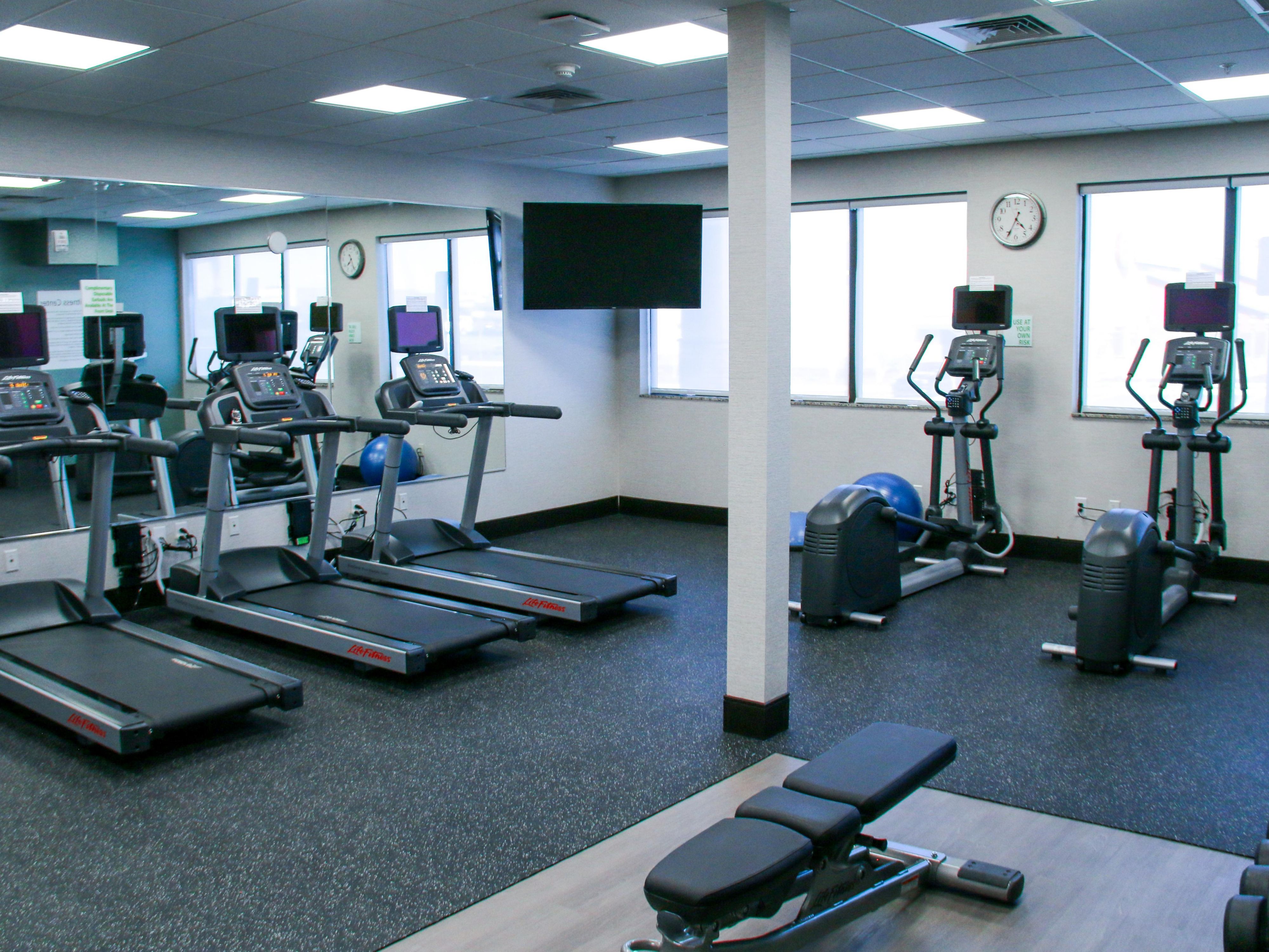Break a sweat anytime in our 24-hour fitness center with treadmills, elliptical machines, free weights, a water station, and clean towels. Use of our state-of-the-art fitness room is included in the price of your stay. 