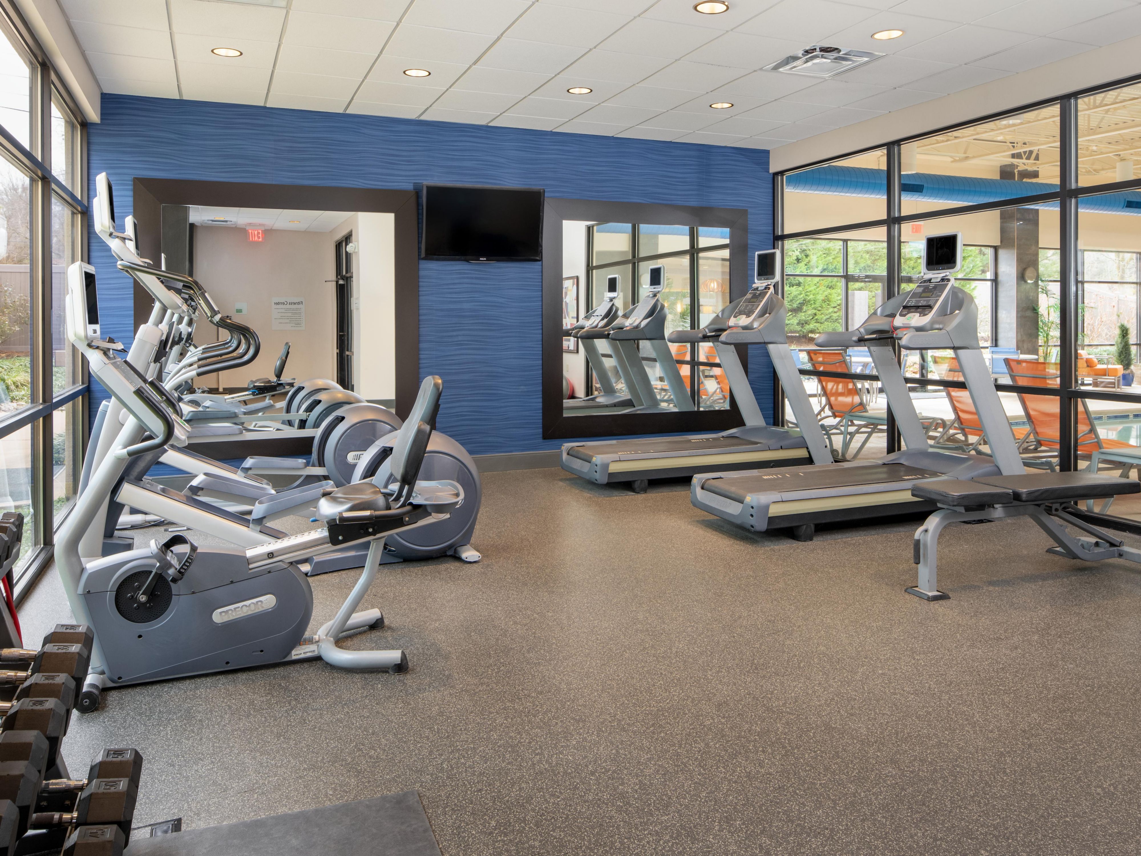 The Fitness Center is a fresh, invigorating space designed to elevate your wellness experience. Whether you're jumpstarting your day with a sunrise cardio session or winding down with a strength-training routine, our updated facility provides the perfect environment to meet your fitness goals in style.
