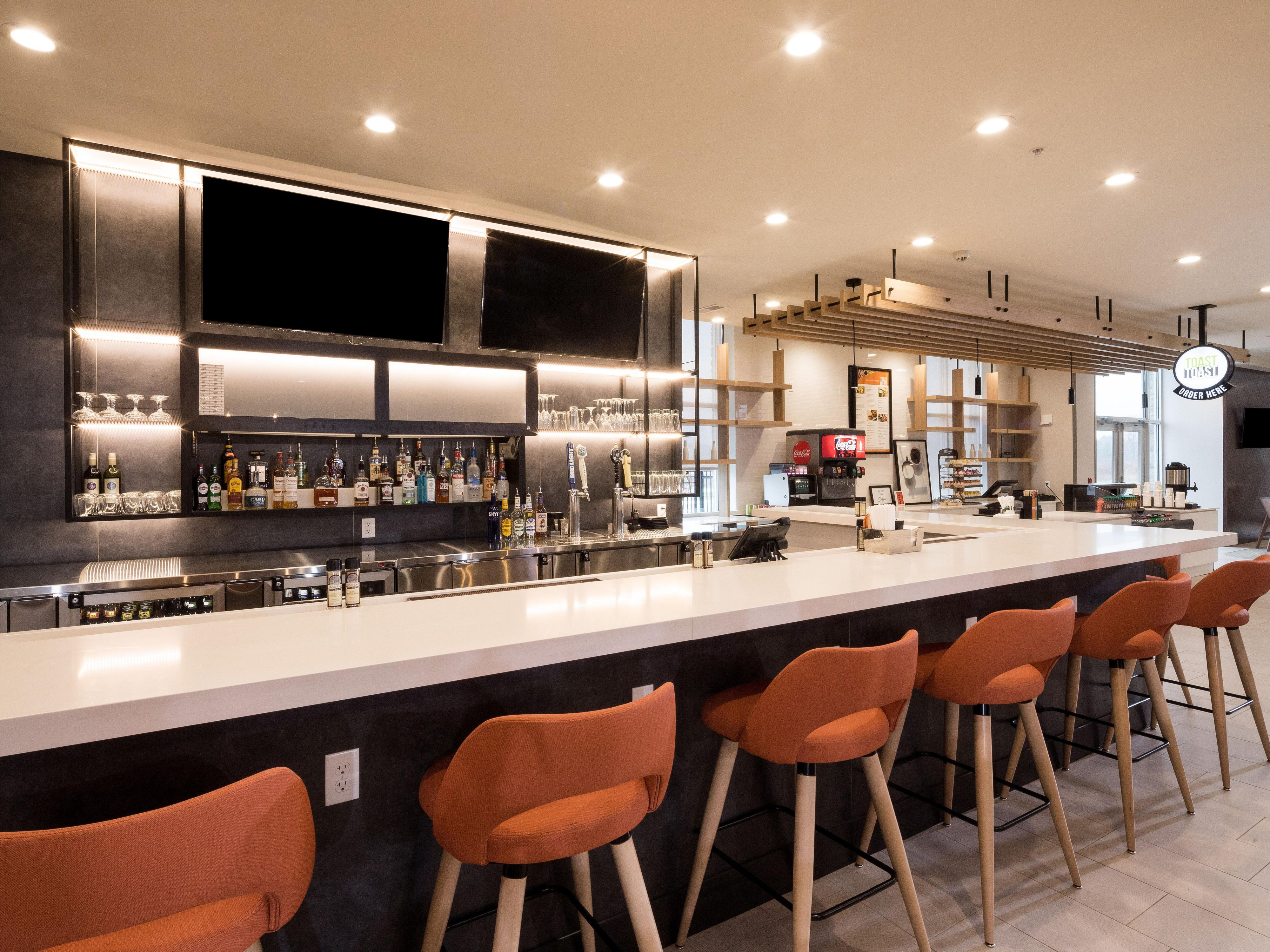 Our hotel boasts a range of amenities including an on-site bar and restaurant called Toast to Toast. Whether you want to grab a quick drink or enjoy a delicious meal, Toast to Toast has got you covered. Now offering weekly specials. 

