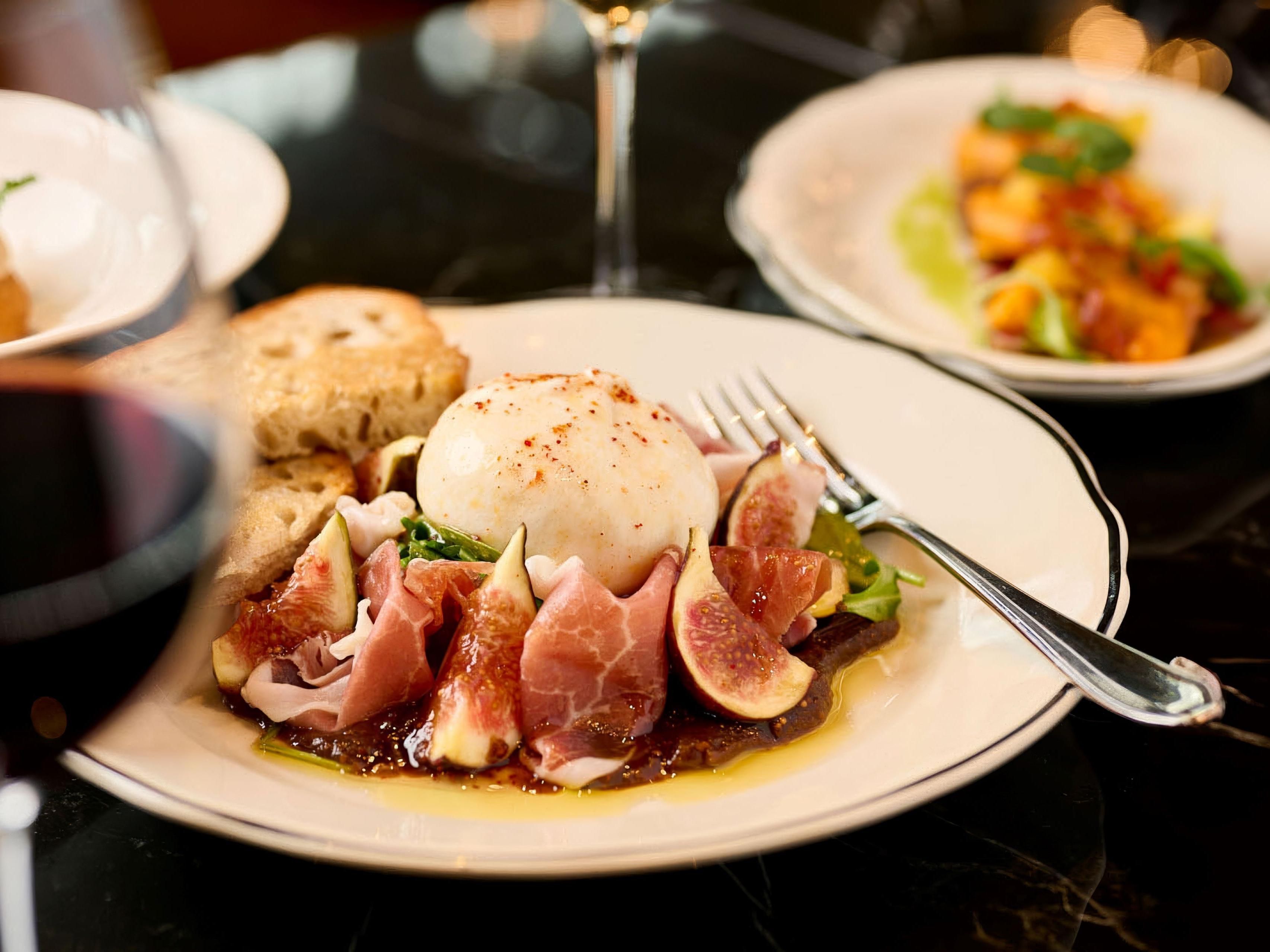 Chez Lionel Brasserie Francaise, where gourmet cuisine meets warm hospitality. Indulge in classic dishes along with chef-inspired creations. A carefully curated wine list features exclusive private imports, perfect for any occasion. Enjoy the inviting dining ambiance paired with attentive, professional service for a truly delightful experience.