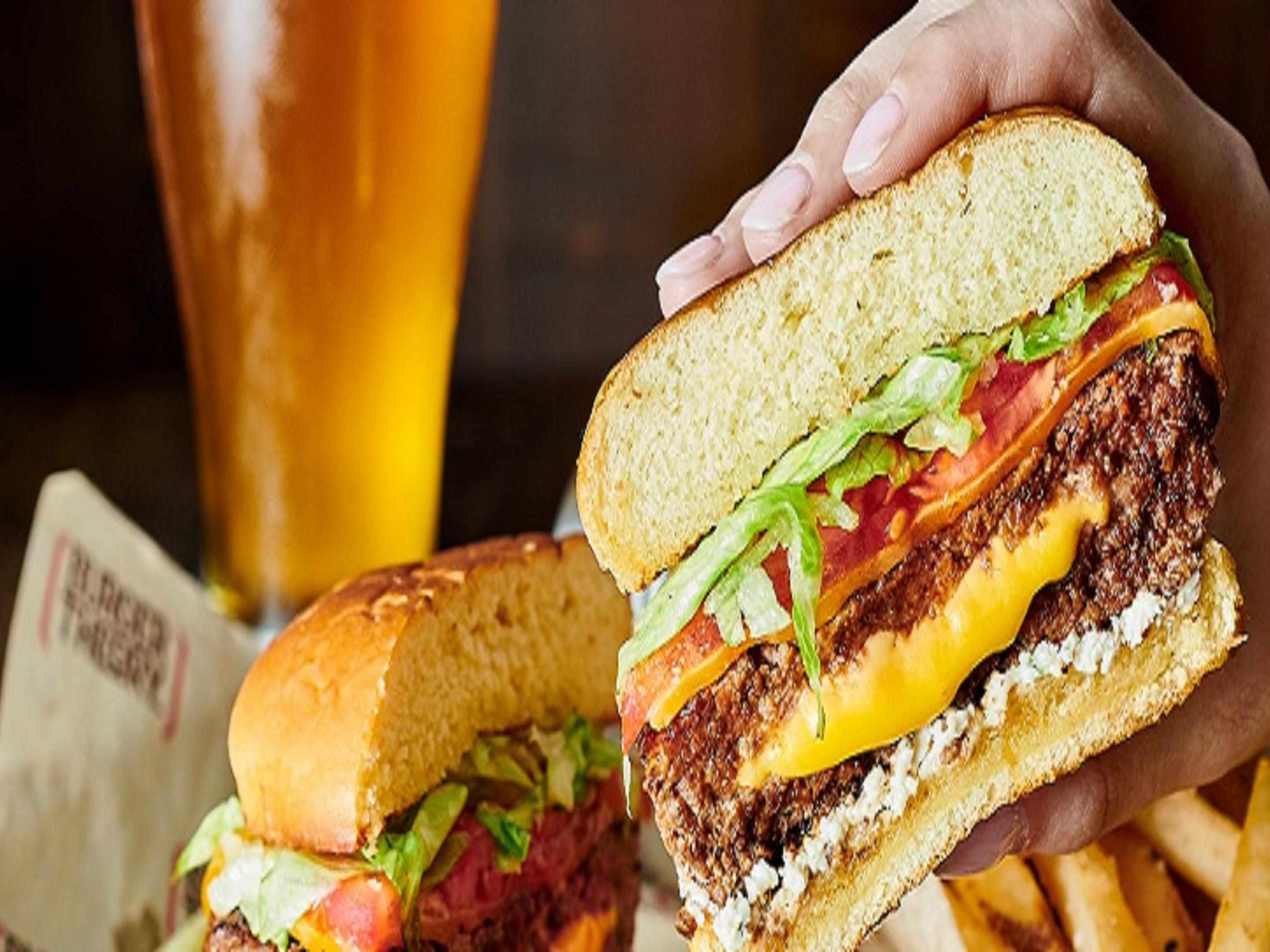 Savor mouthwatering burgers, crisp salads, and crave-worthy appetizers at Burger Theory, our on-site restaurant. Customize your perfect burger with a variety of fresh toppings, and pair it with a local draft or cocktail from the full bar. Whether you're dining solo or with family, it's the perfect place to unwind and enjoy a delicious meal.
