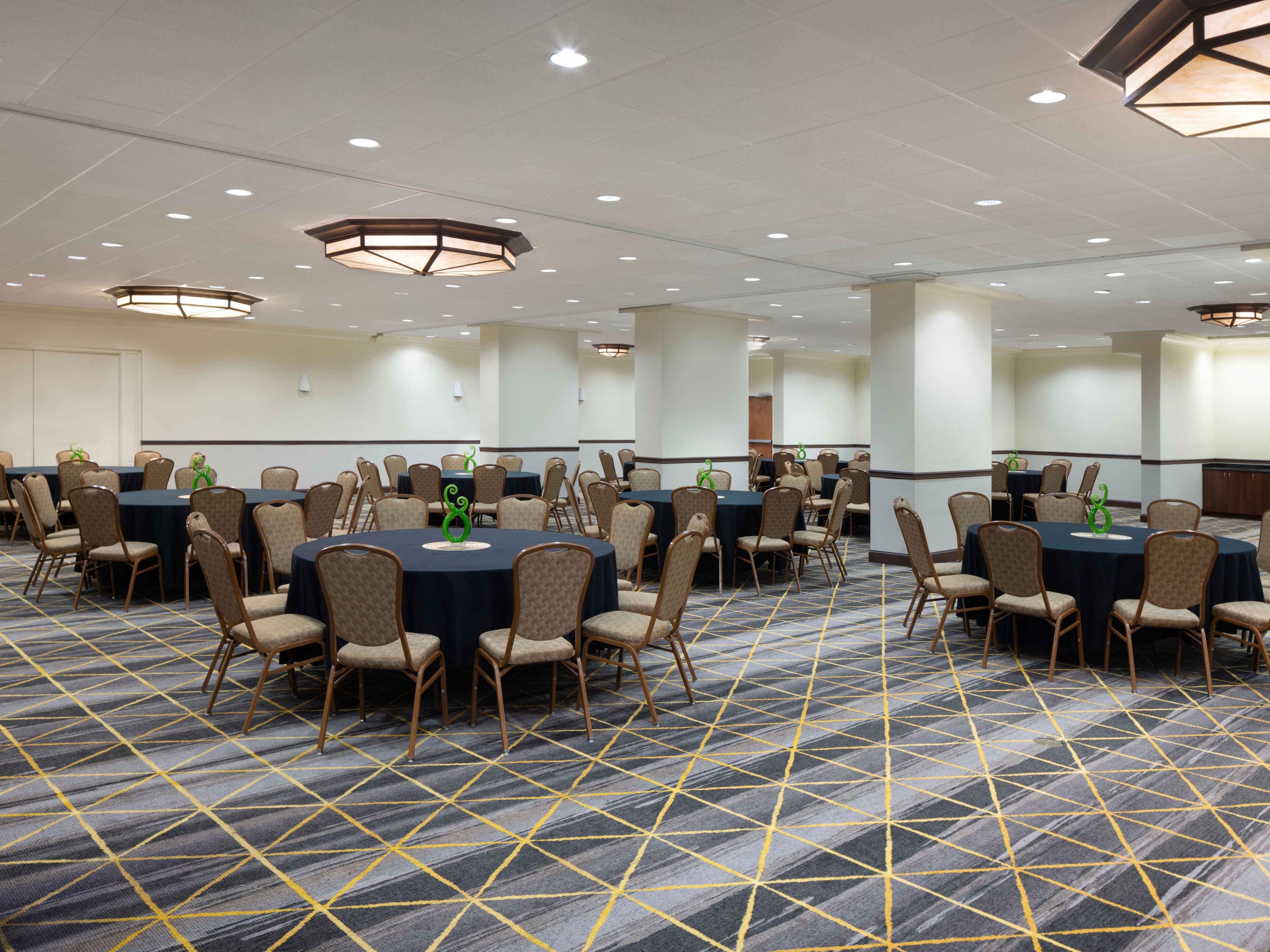 Host events in 3,743 sq ft of versatile space, including four meeting rooms, a ballroom for 250 guests, and a boardroom. Perfect for weddings, associations, and SMERF events, our spaces feature modern AV equipment, catering services, and custom menus to make your event truly memorable.