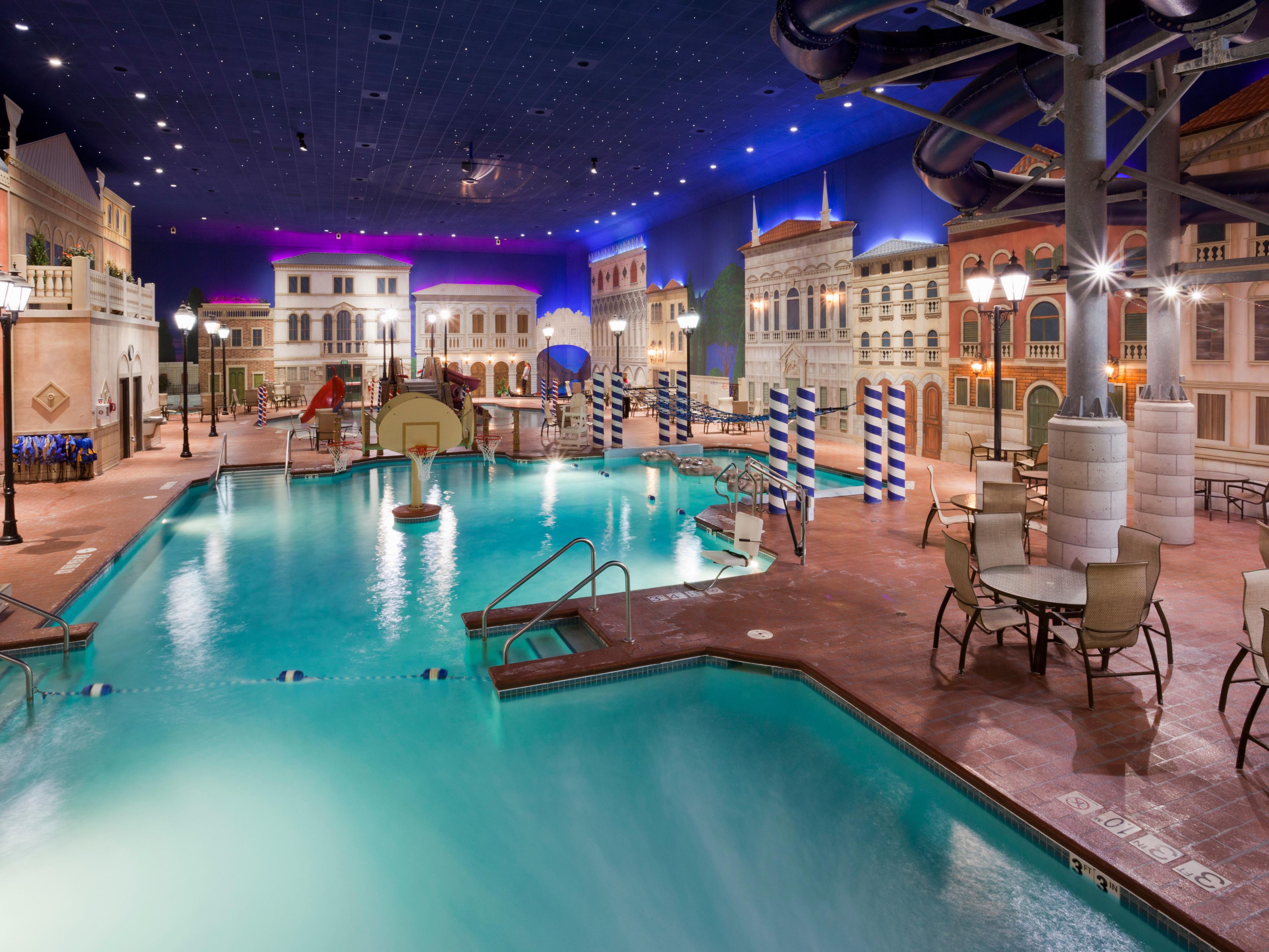 Holiday Inn Venetian Waterpark is fun for the whole family to enjoy! Spend weekends splashing in our kids area, climbing across the floating log course, testing your skills at our hoops or sliding down our water slides! Take a quick break at one of our endless food options with a concession stand, restaurant and bar steps from the pool!