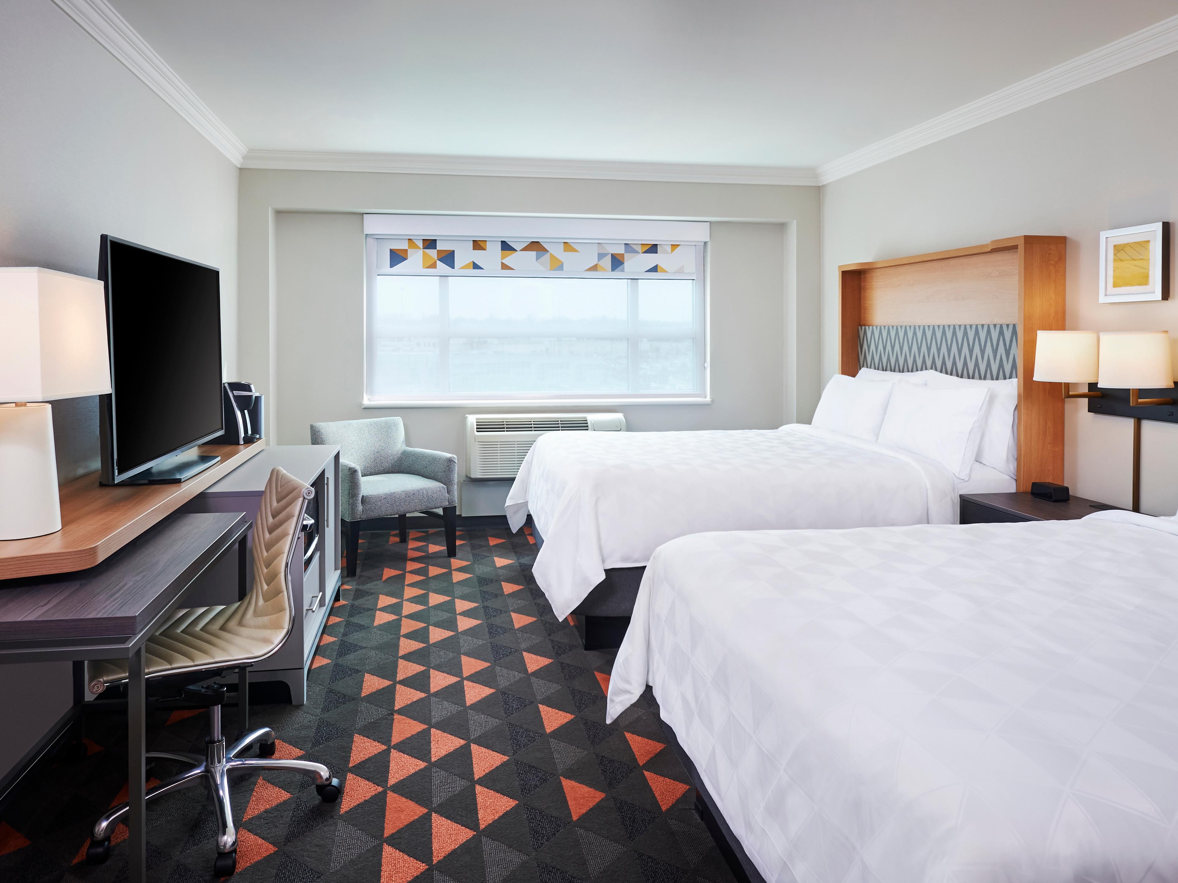 We've taken care of every detail, from fresh white linens and ergonomic chairs to a spacious walk-in shower and thoughtfully designed working nooks. With modern décor that's bright, cheerful, and inviting, our hotel is ready to welcome you in.  