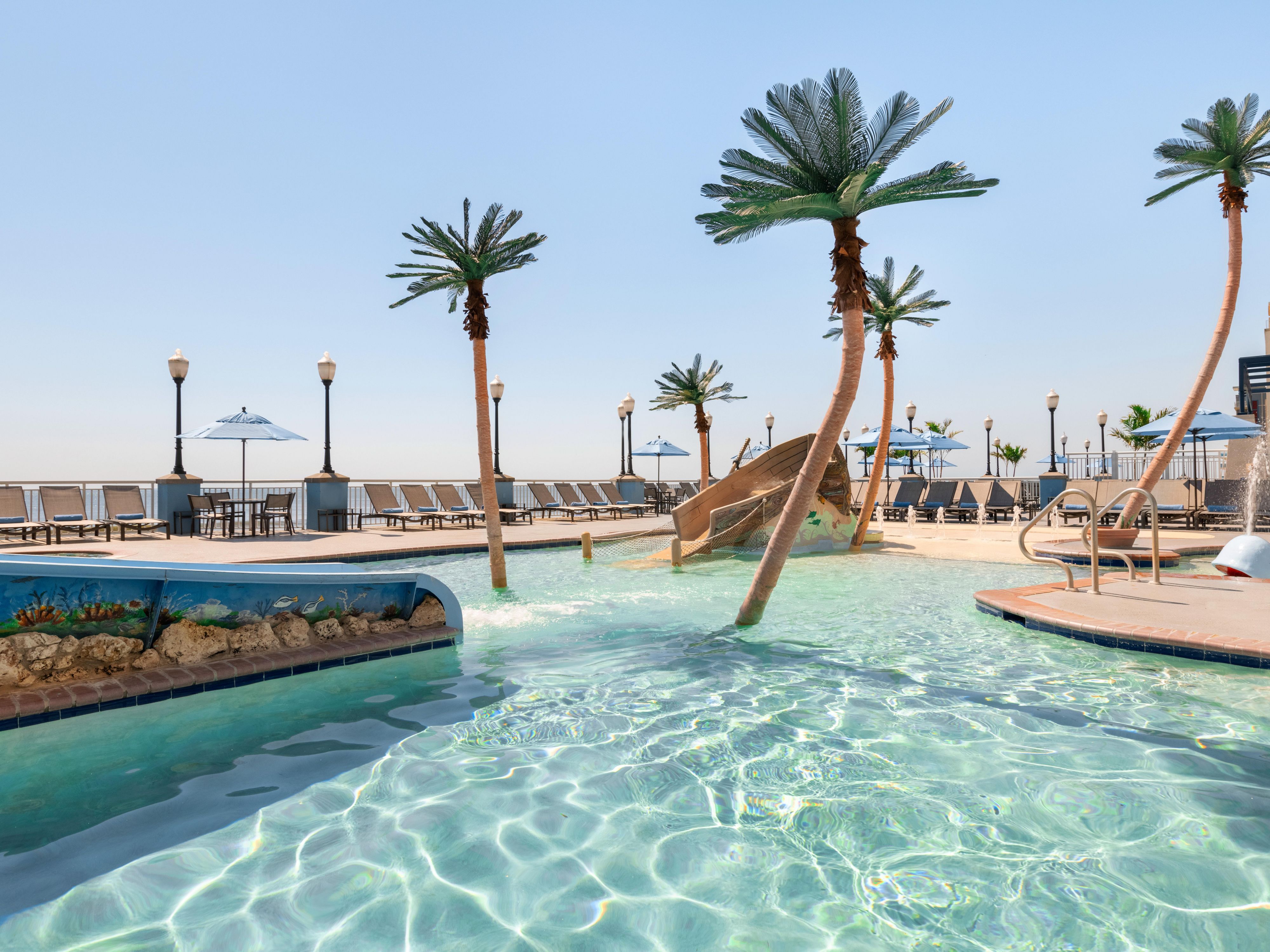 Spend a relaxing time at our expansive outdoor swimming pool.