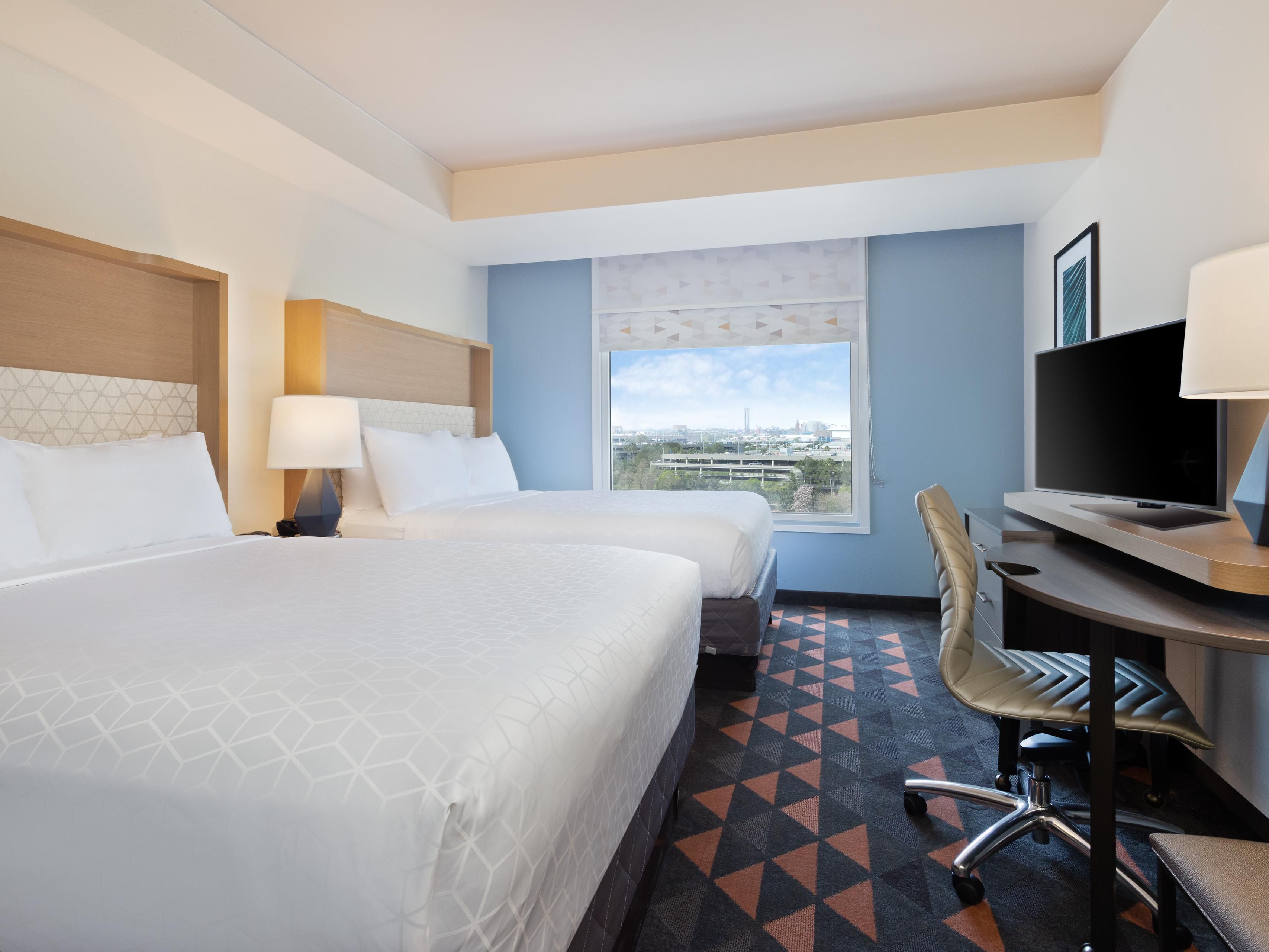 Pull back the covers, hop in and catch your favorite TV show.