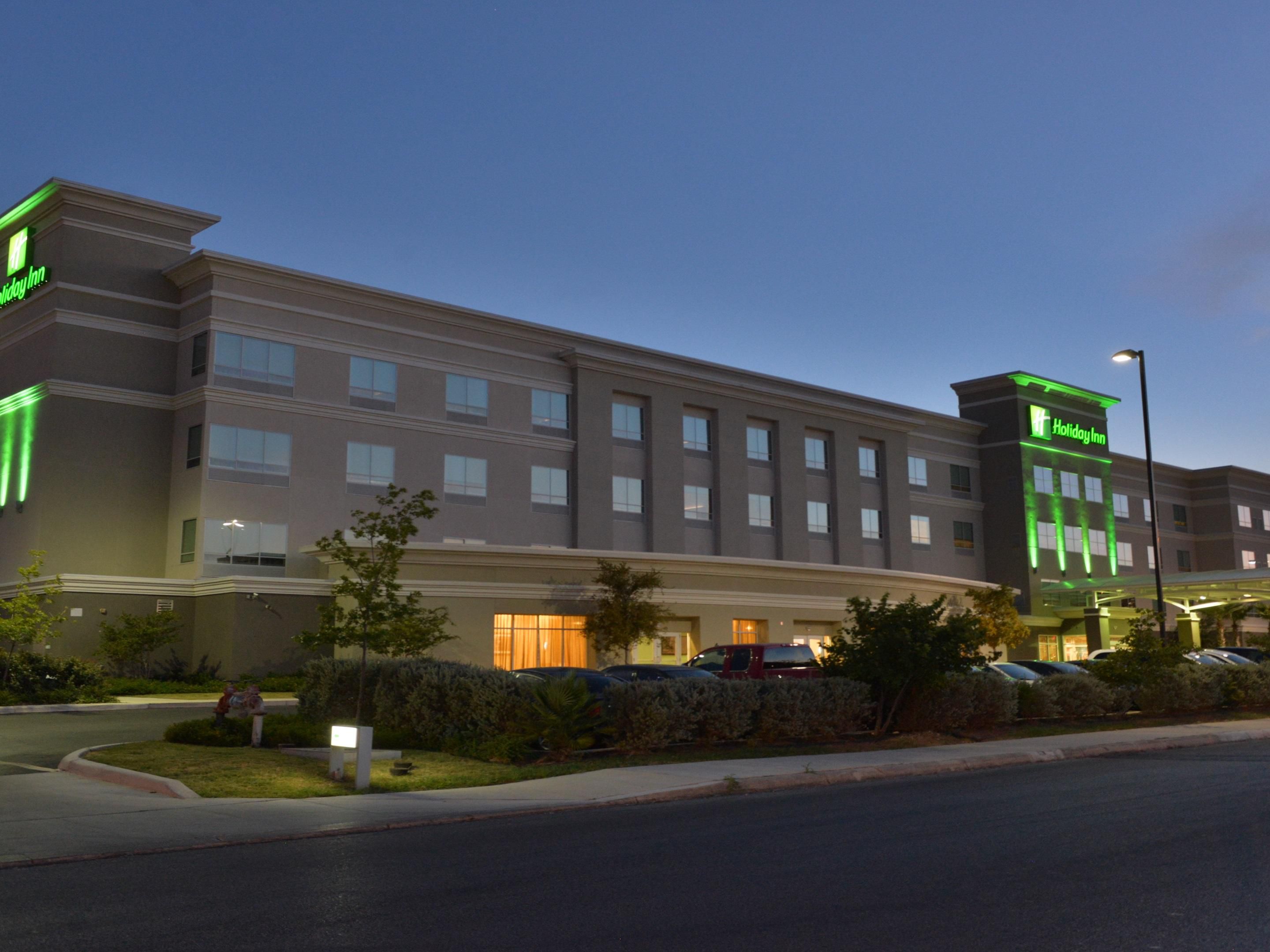 Best hotel to stay few minutes away from Six Flag Fiesta and UTSA.