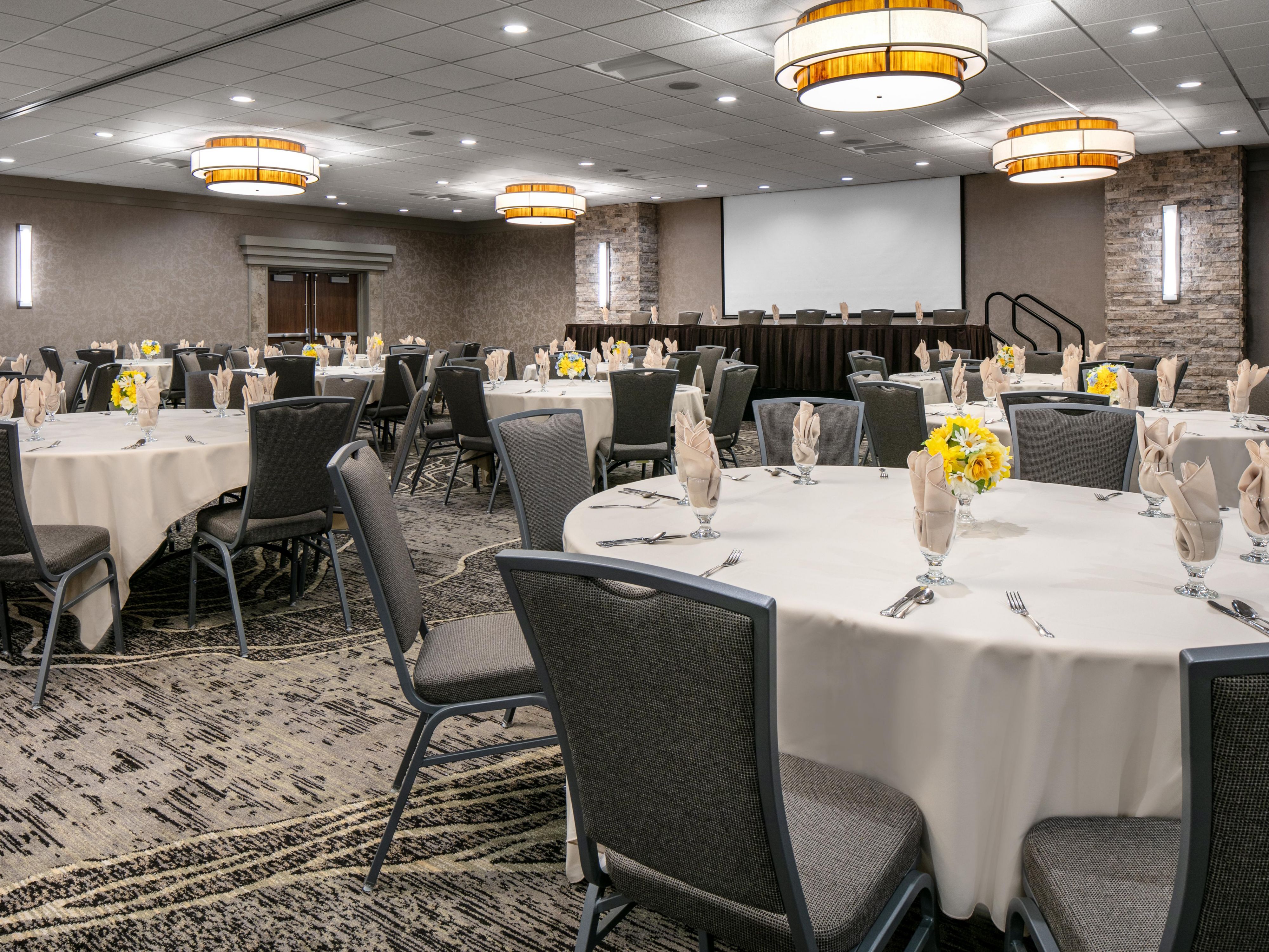 With 18 meeting rooms and 17,000 sq. ft. of event space, we can seat up to 375 guests for a wedding or 325 guests for a classroom style meeting. Our event space can be beautifully transformed to meet the needs of your style and budget. Contact our professional event planners at 515-727-0404 for a free custom quote today!