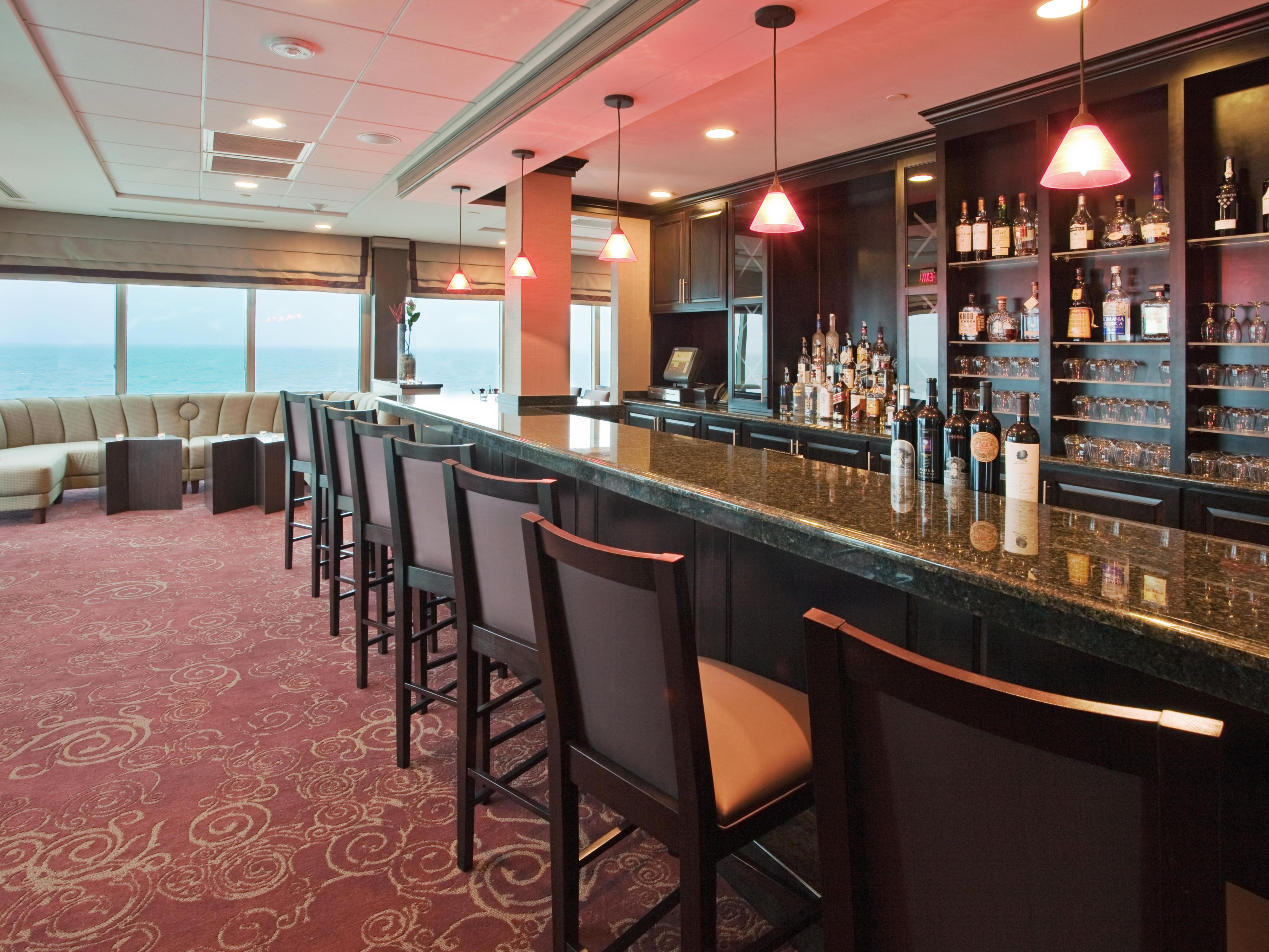 Satisfy every craving with our three dining options where kids under 12 eat free! Fuel your day with a delightful breakfast at The Greenery Cafe. Enjoy casual poolside dining and refreshing drinks at The Square Whale and savor a delicious Italian dinner at The Isle of Capri serving fine Italian cuisine with stunning ocean views. 