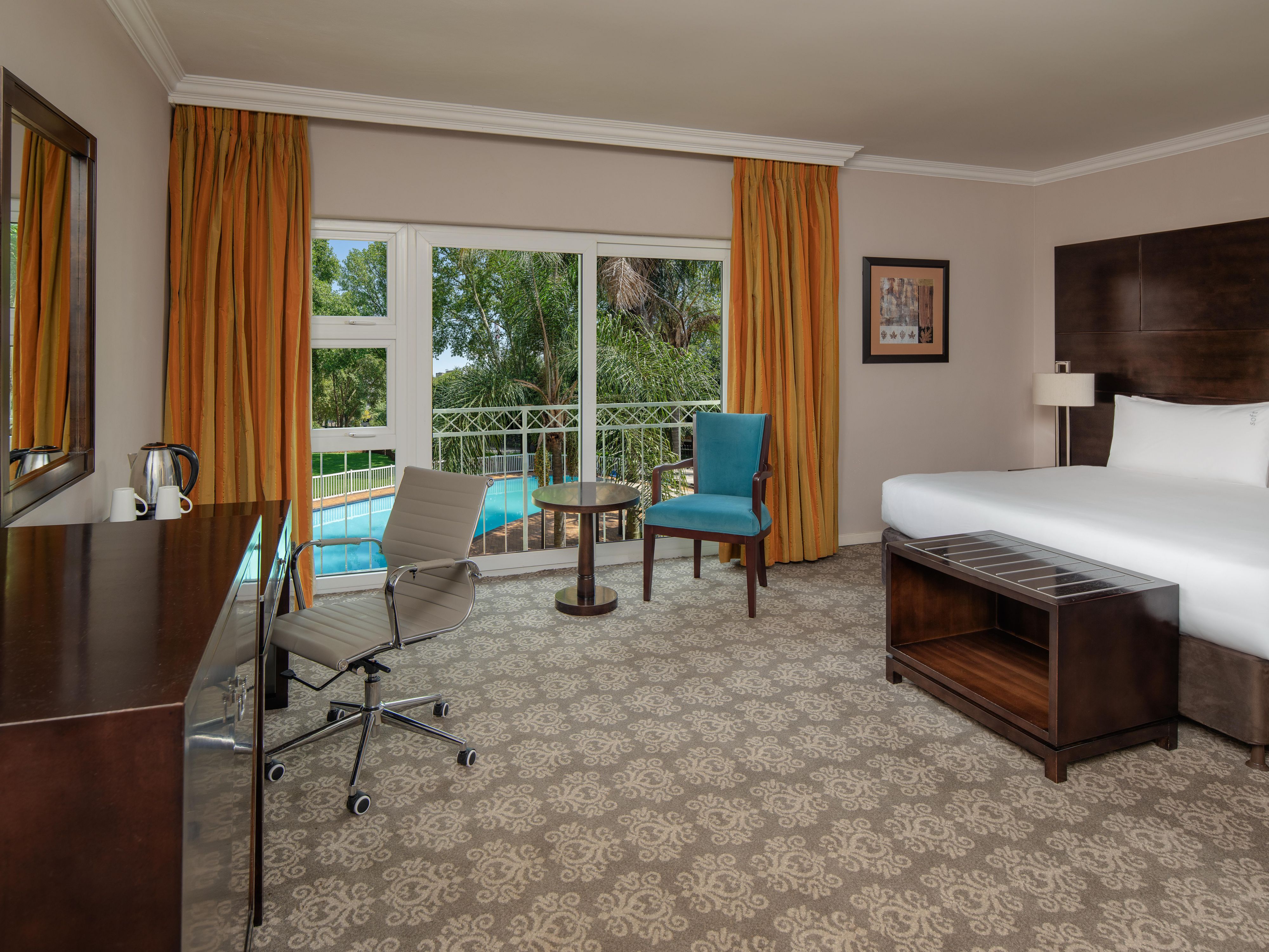 Activate vacation mode with serene pool views from your room