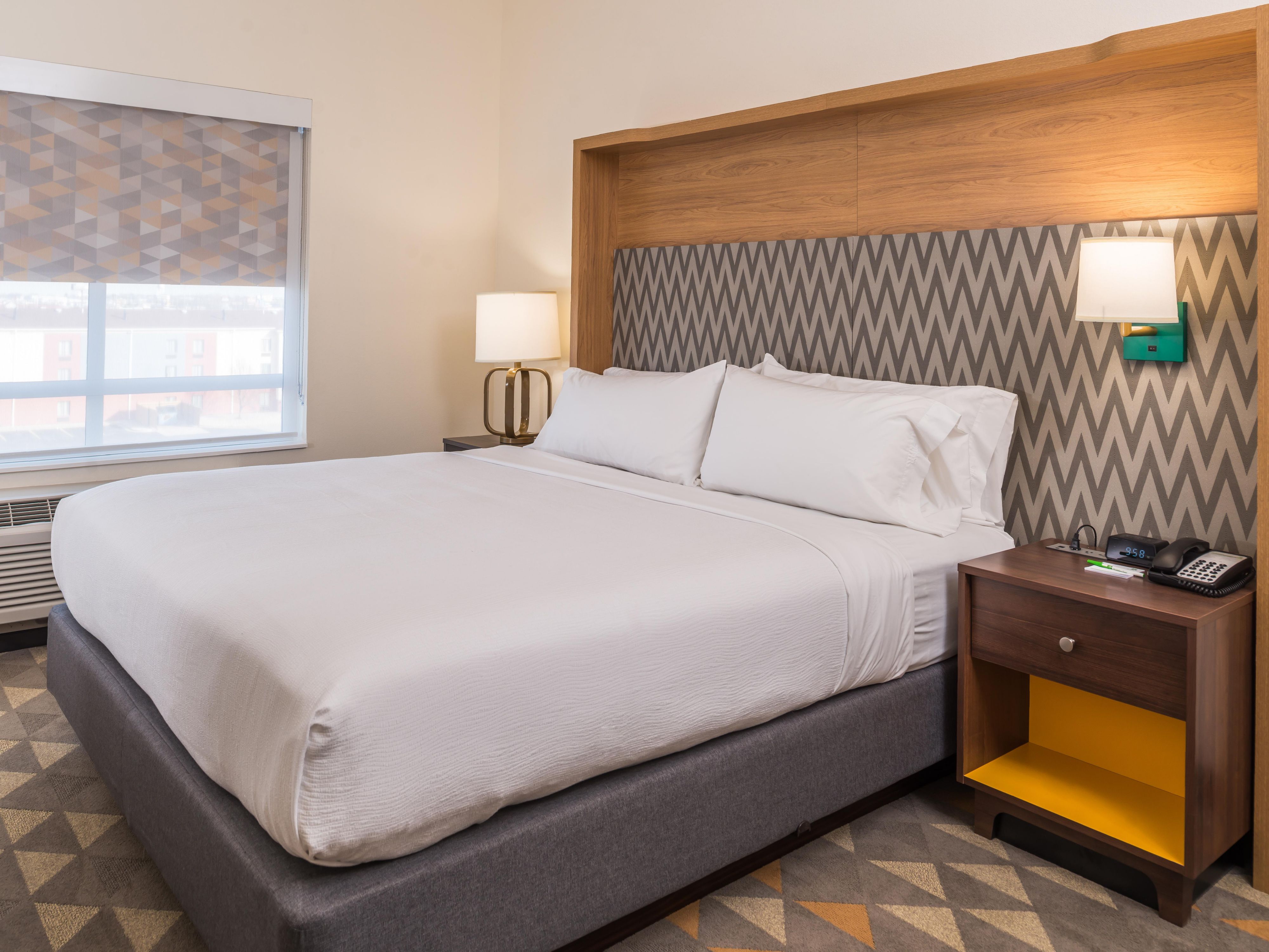 Pull back the covers, hop in, and catch your favorite TV show.