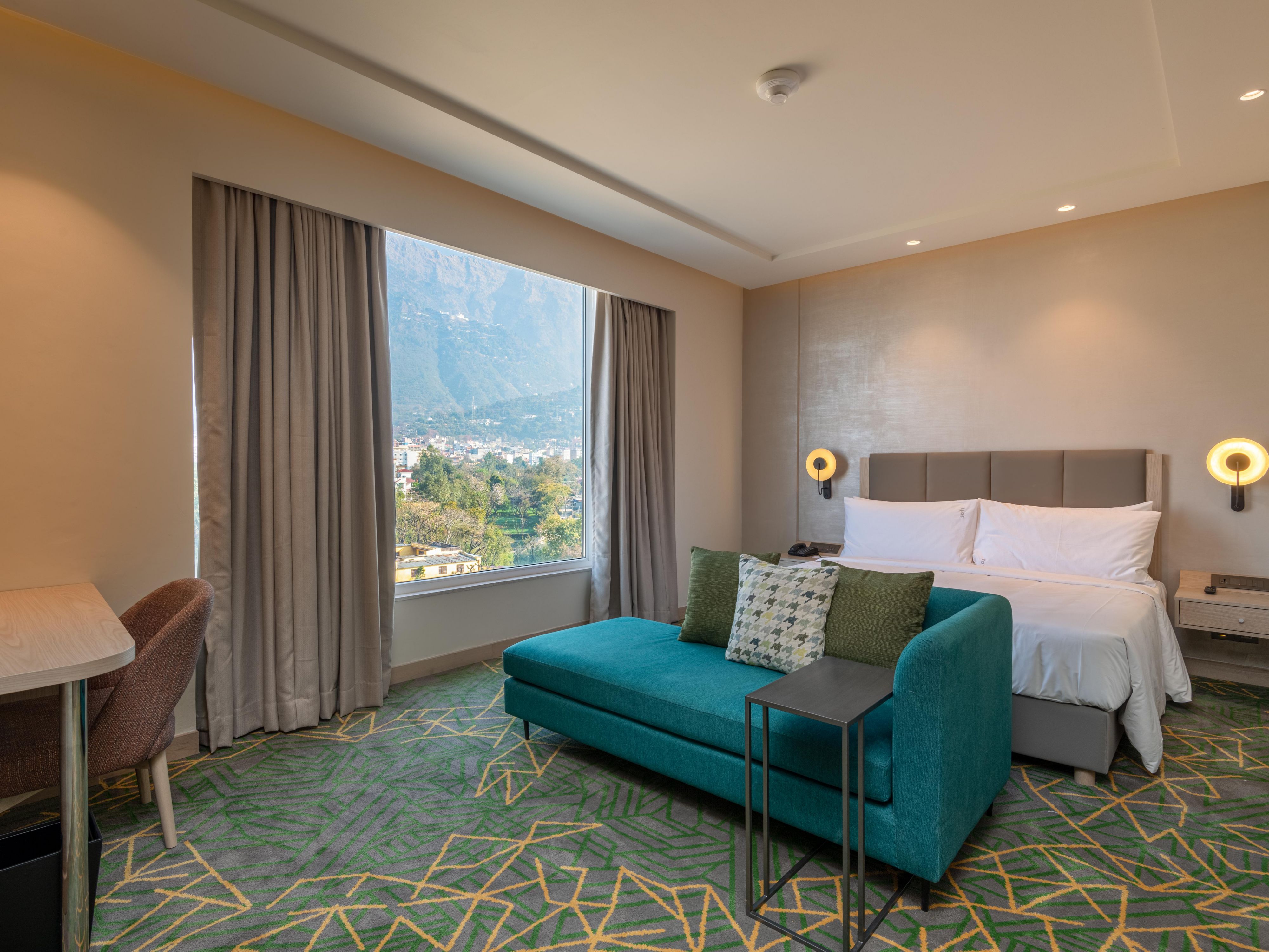 Hotel room has a scenic hill view facing towards the Mata Vaishno devi shrine ,an  addition to spiritual enrichment guest can enjoy during their stay.